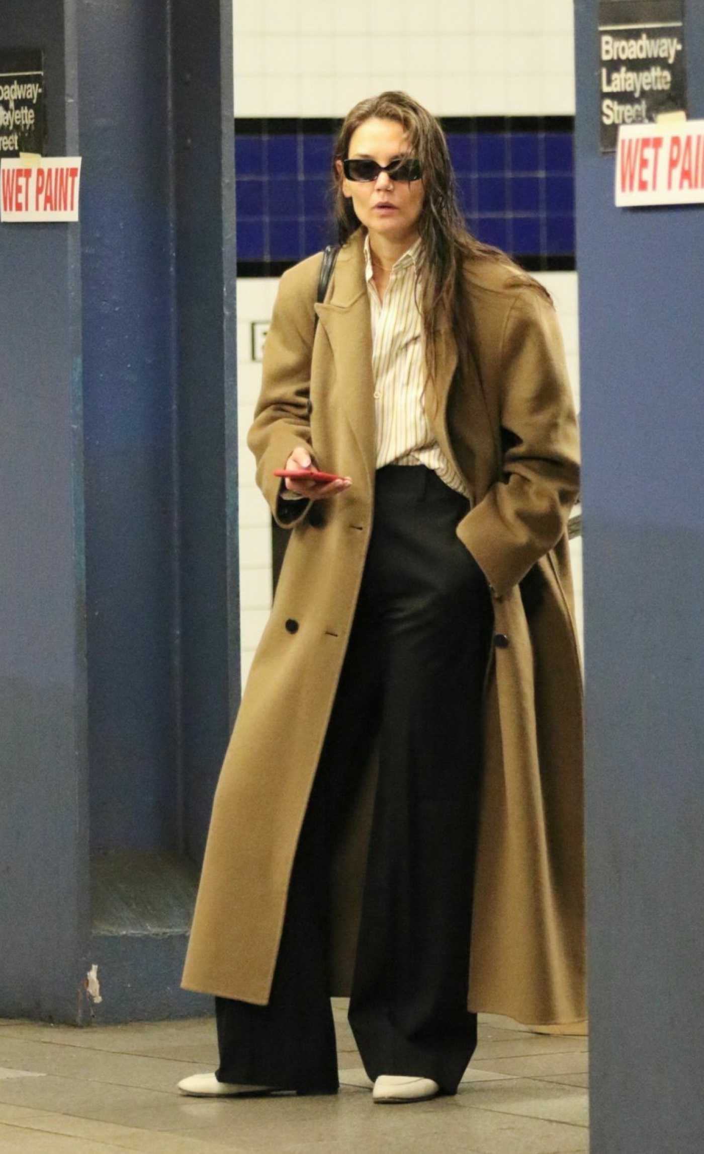 Katie Holmes in a Black Pants Waiting for a Uptown Train in NYC 03/24/2024