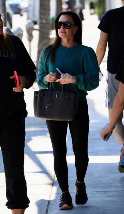 Kyle Richards in a Black Sneakers