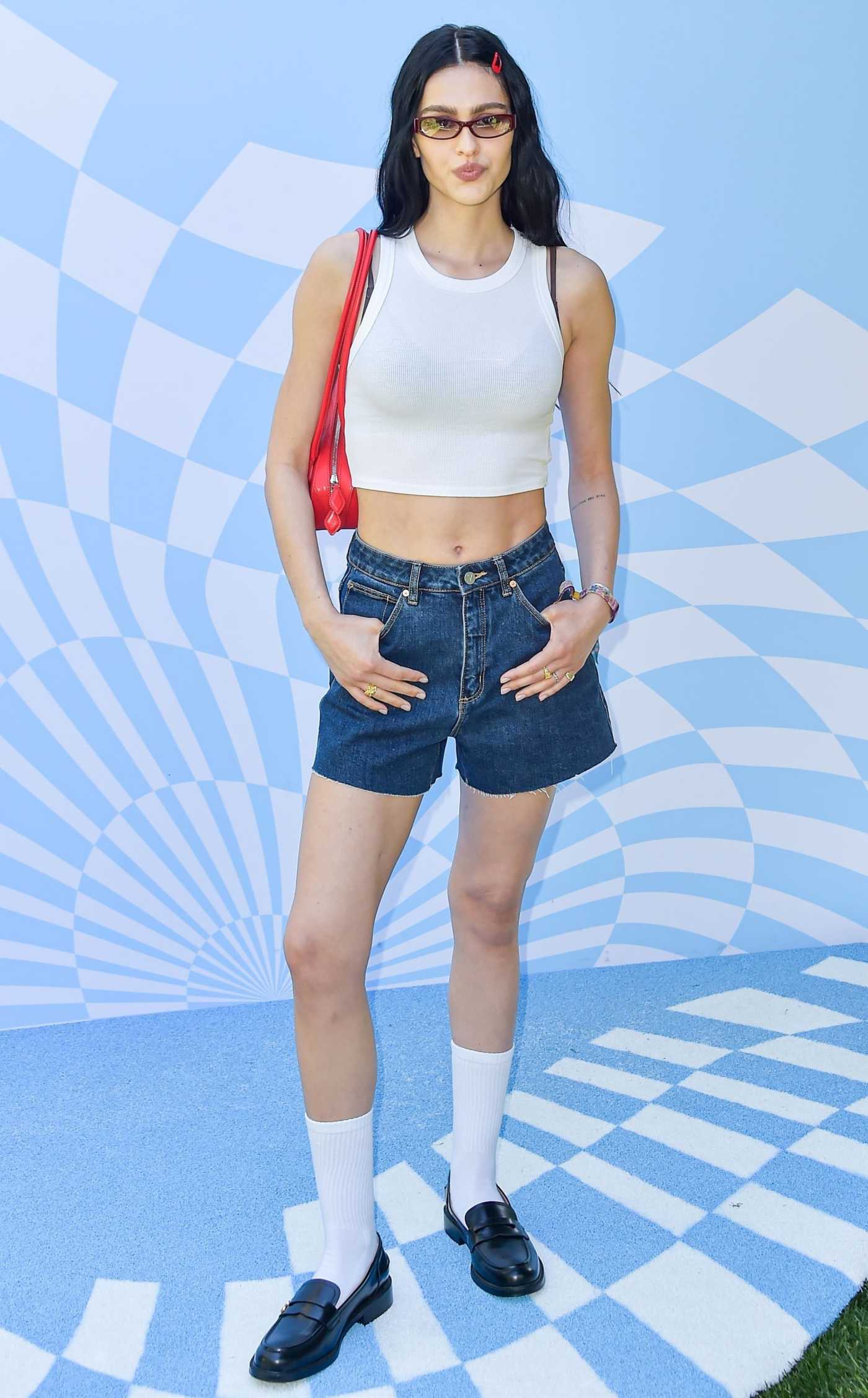 Amelia Hamlin Attends Revolve Festival During 2024 Coachella Music and Arts Festival in Palm Springs 04/13/2024