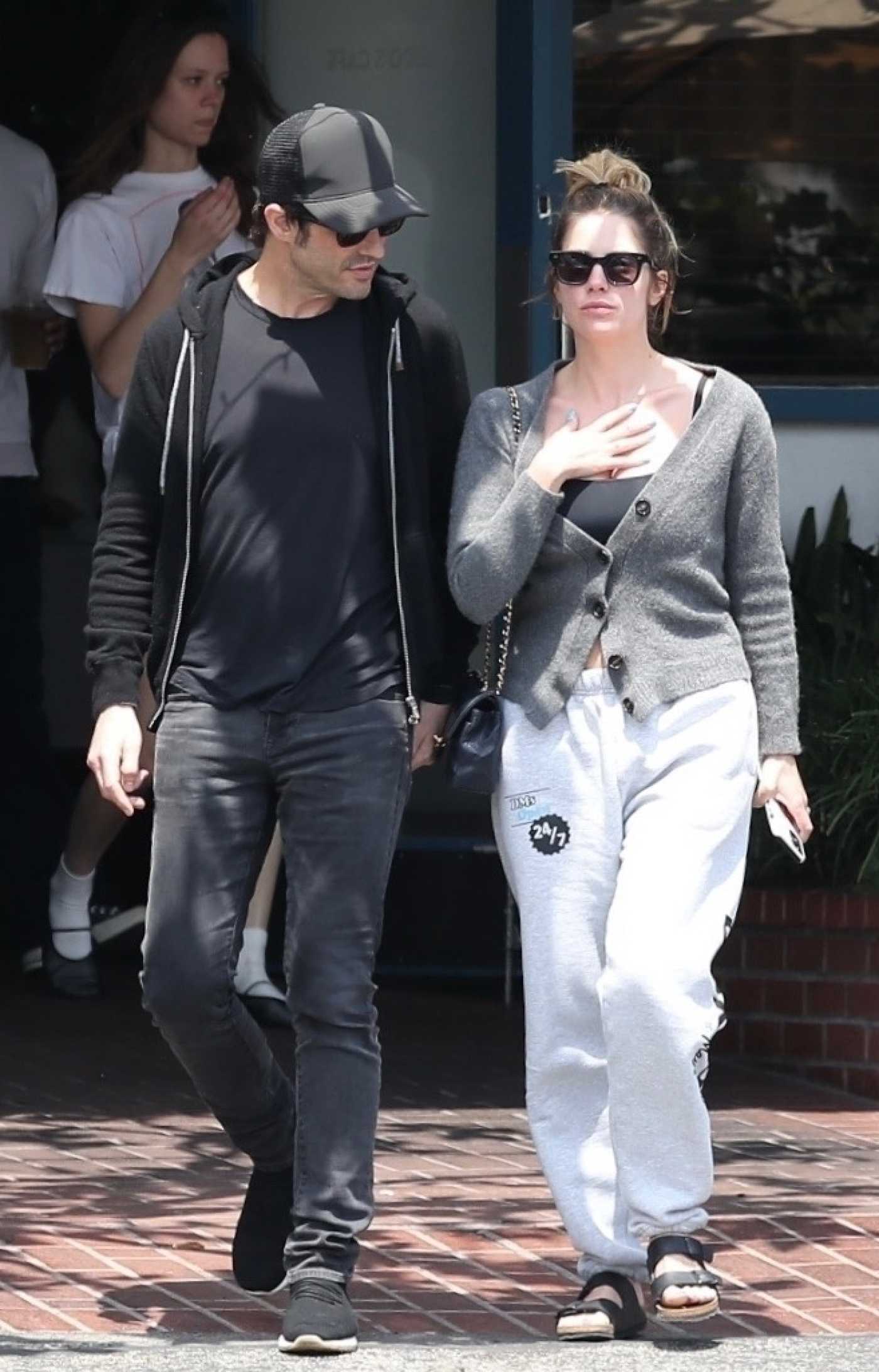 Ashley Benson in a Grey Cardigan Was Seen Out with Brandon Davis in West Hollywood 04/19/2024