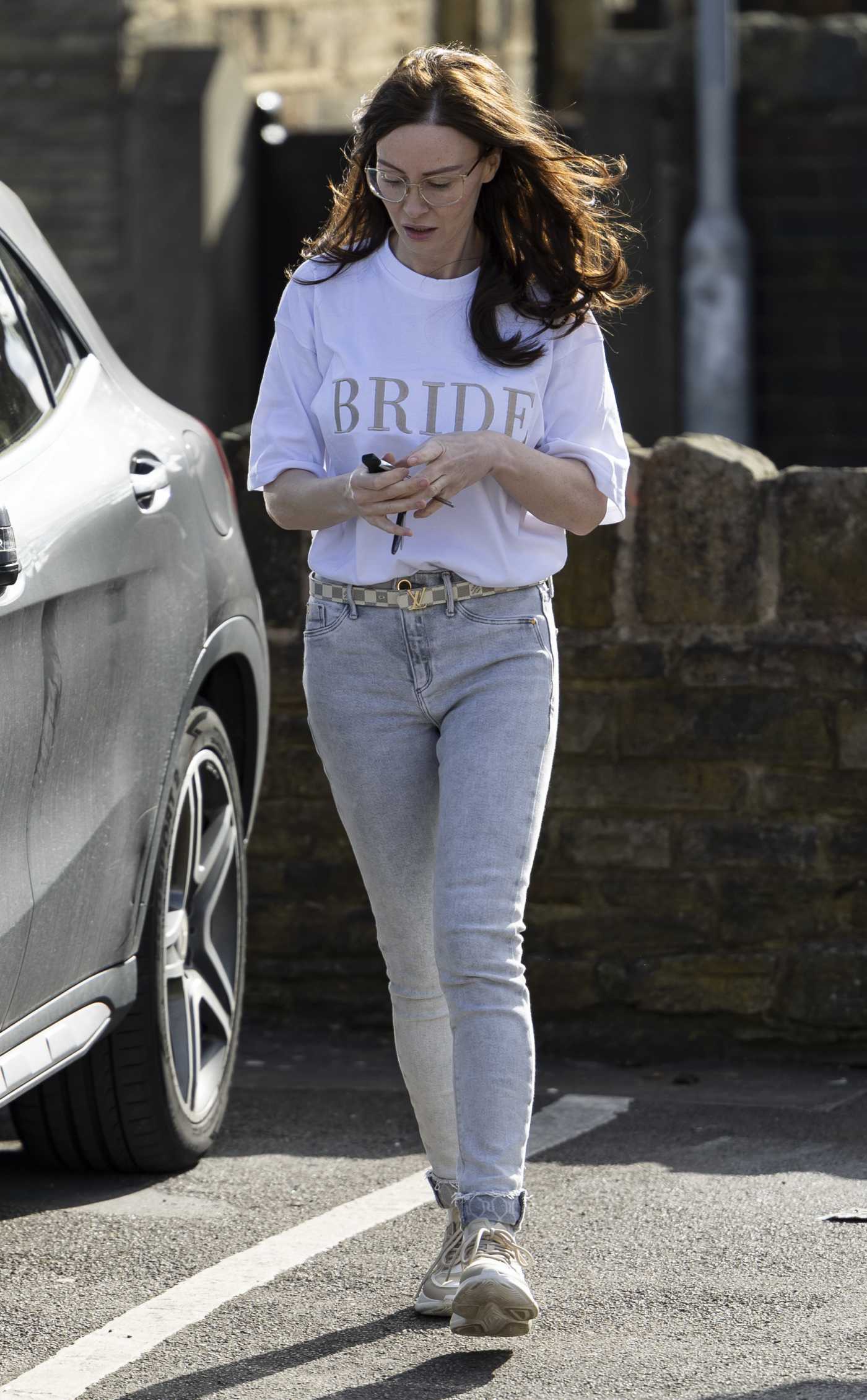 Chanelle Hayes in a White Tee Departing the Bridal Boutique in Wakefield 04/21/2024