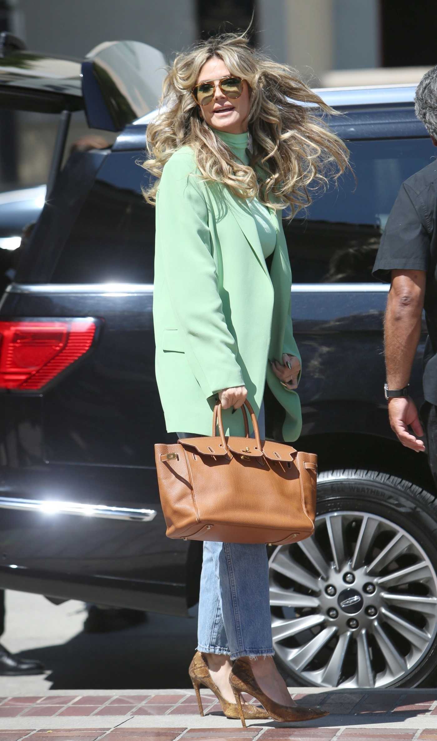 Heidi Klum in a Neon Green Blazer Arrives to America's Got Talent Taping in Pasadena CA 04/03/2024