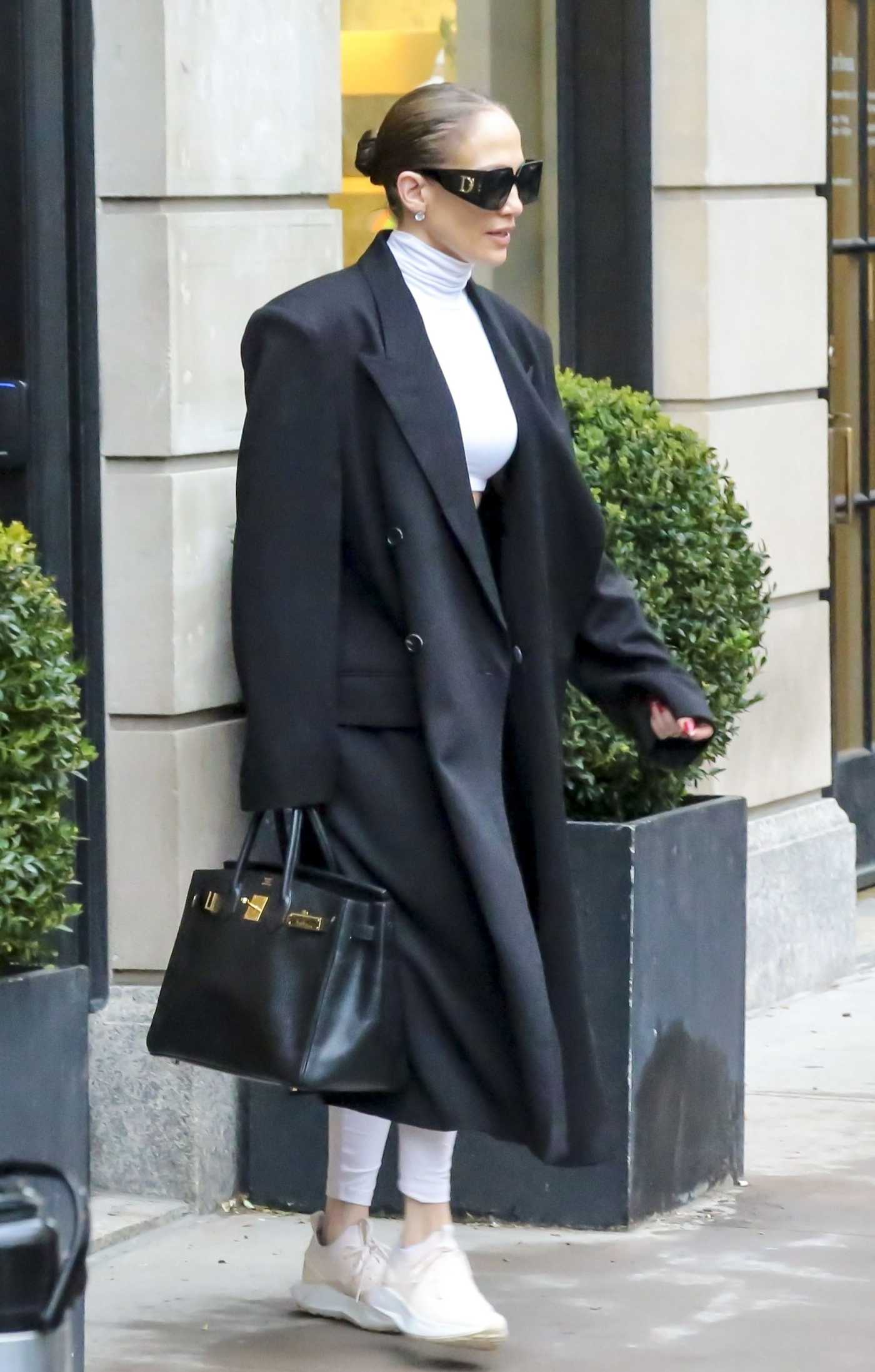 Jennifer Lopez in a Black Coat Was Seen Out in Manhattan in NYC 04/11/2024