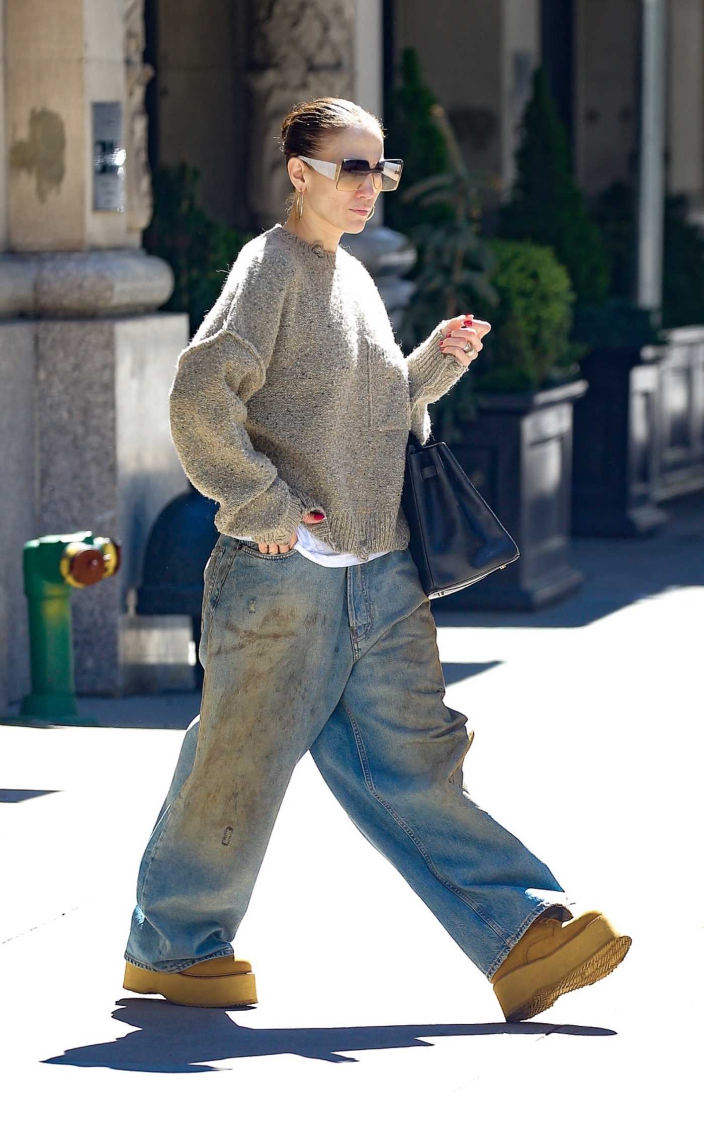 Jennifer Lopez in a Grey Sweater Was Seen Out in New York 04/26/2024