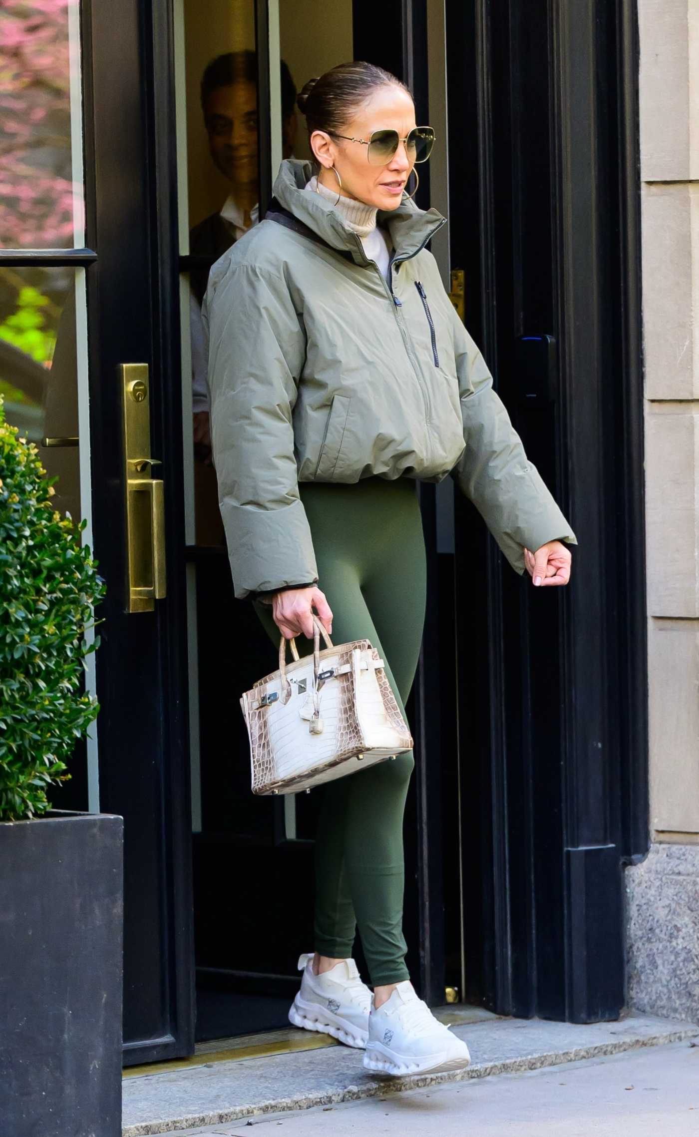 Jennifer Lopez in an Olive Jacket Leaves Her Apartment in New York 04/16/2024