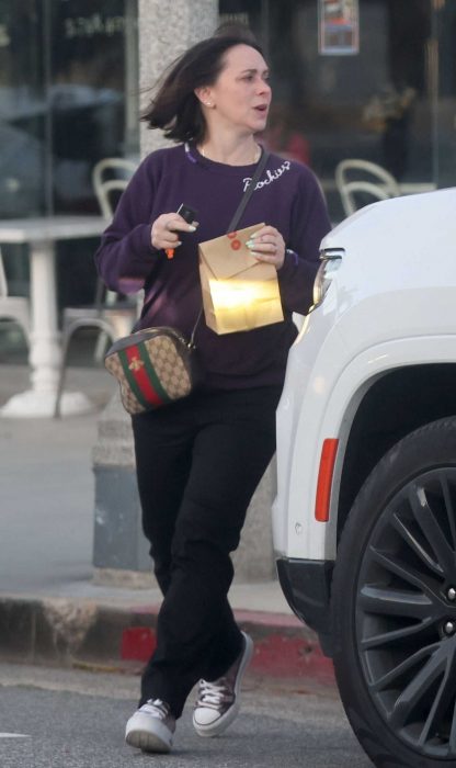 Jennifer Love Hewitt in a Purple Sweatshirt