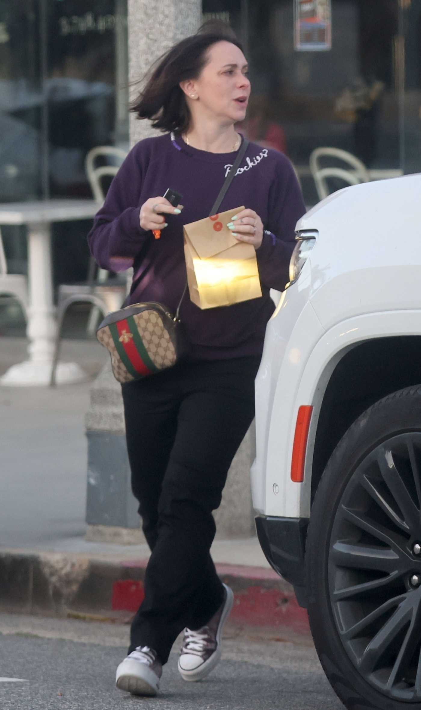 Jennifer Love Hewitt in a Purple Sweatshirt Leaves the Movie Theater in Los Angeles 04/11/2024