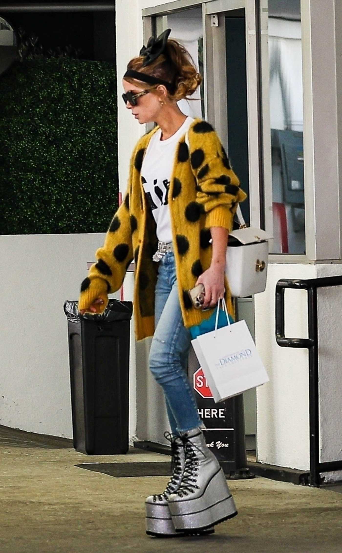 Kate Beckinsale in a Yellow Polka Dot Cardigan Leaves a Skin Care Clinic in Beverly Hills 04/16/2024