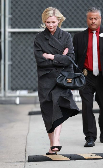 Kirsten Dunst in a Grey Coat