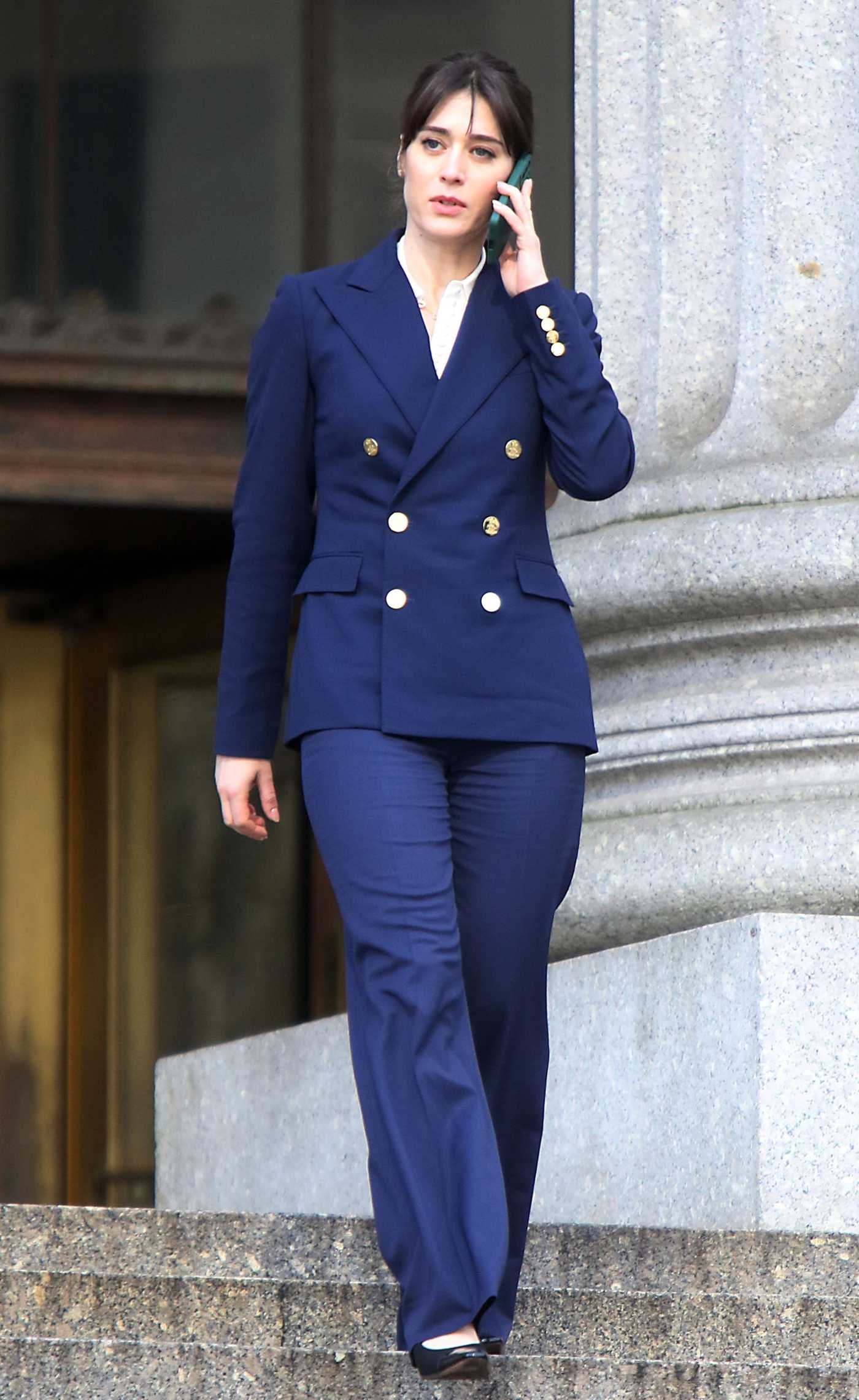 Lizzy Caplan in a Blue Pantsuit on the Set of the Zero Day Series at New York State Supreme Court Building in New York 04/14/2024