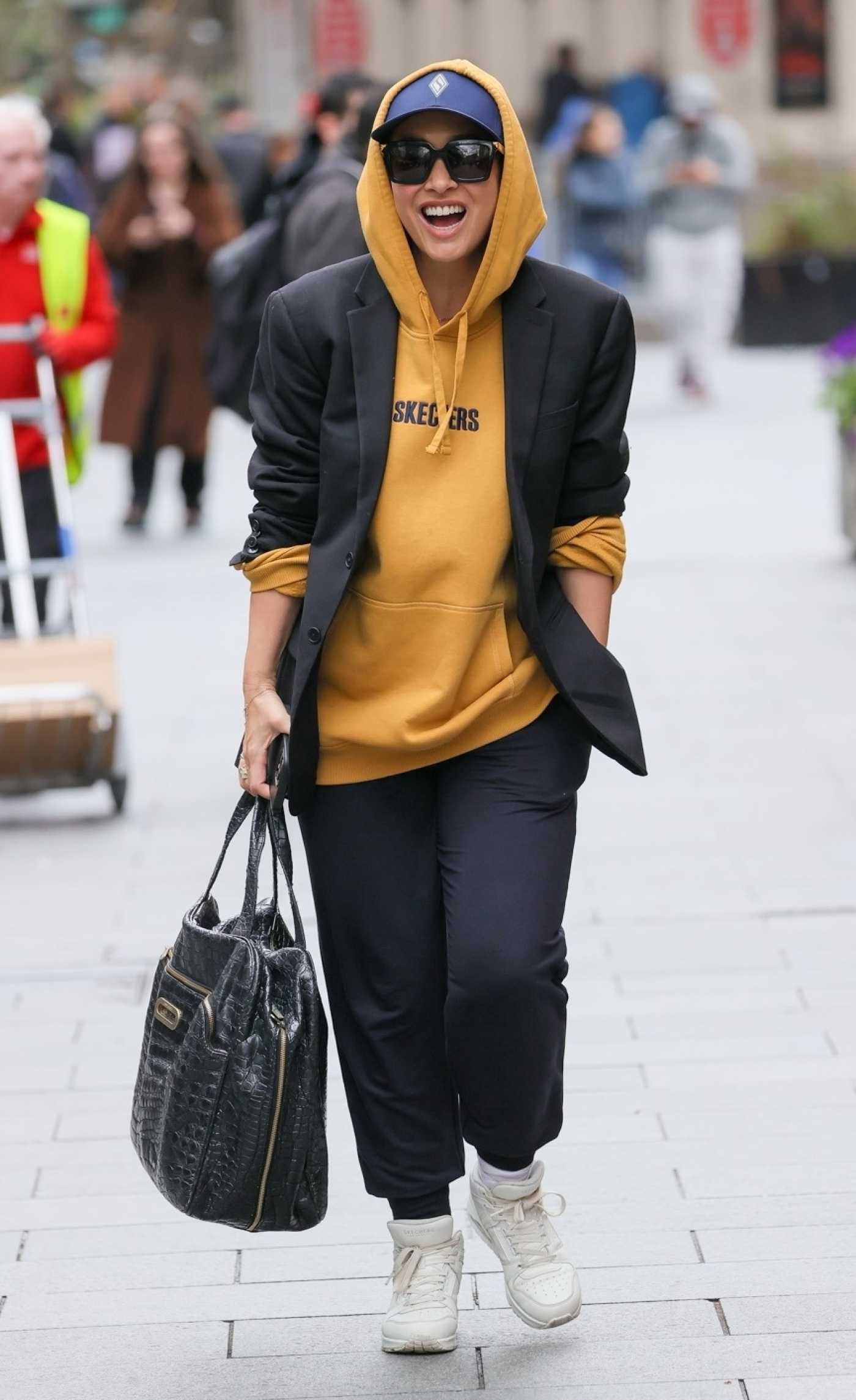Myleene Klass in a Yellow Hoodie Arrives at the Smooth Radio in London 04/05/2024