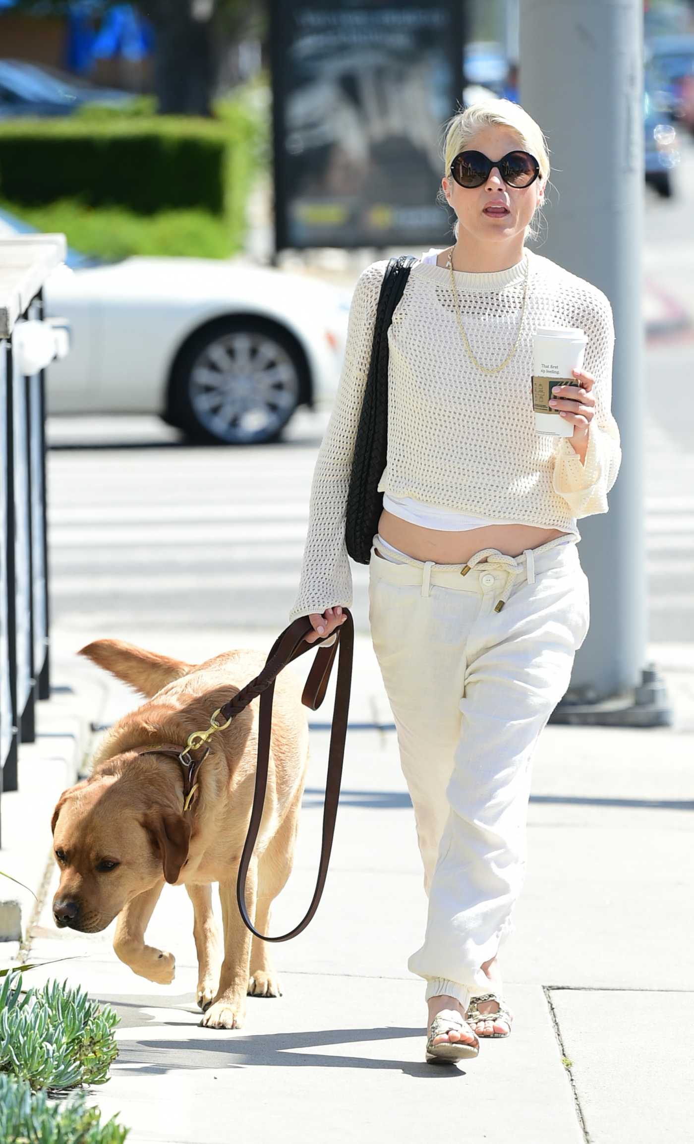 Selma Blair in a White Pants Heads Out for a Coffee with Her Dog Scout in Los Angeles 04/16/2024