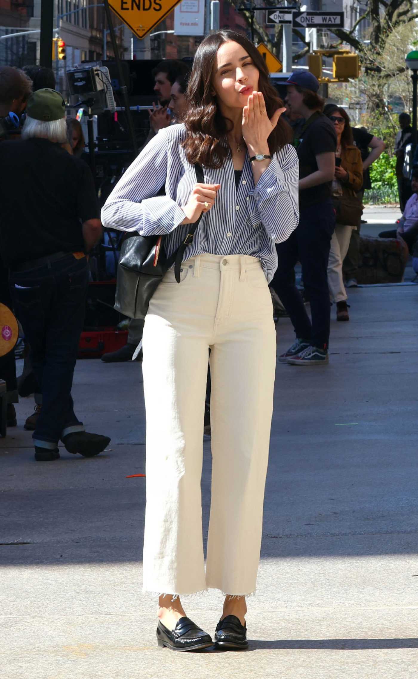 Sofia Carson in a White Pants on the Set of The Life List in Downtown, Manhattan in New York City 04/15/2024