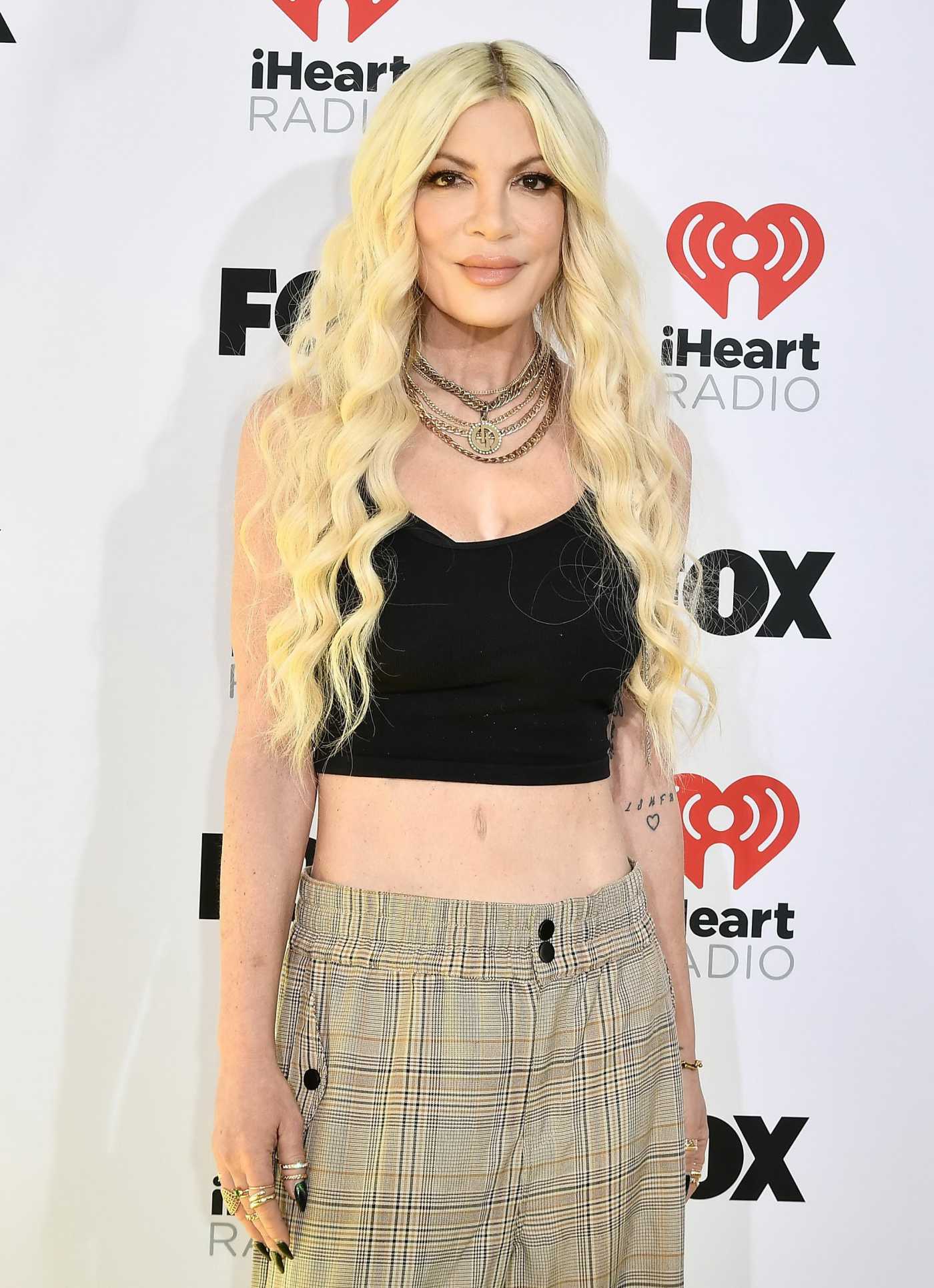 Tori Spelling Attends 2024 iHeartRadio Music Awards at Dolby Theatre in Hollywood 04/01/2024