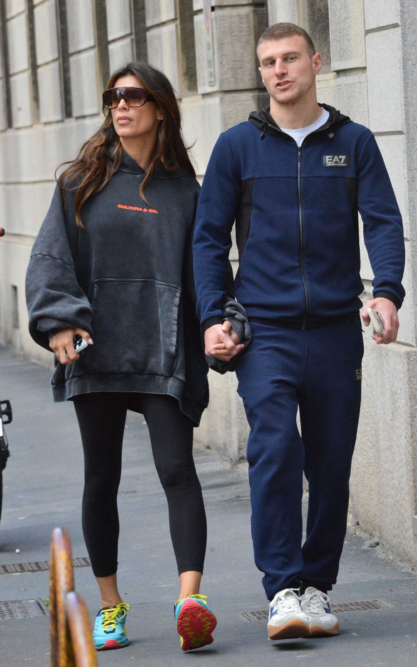 Elisabetta Canalis in a Black Hoodie Was Seen Out with Her New Boyfriend Georgian Cimpeanu in Milan 05/28/2024