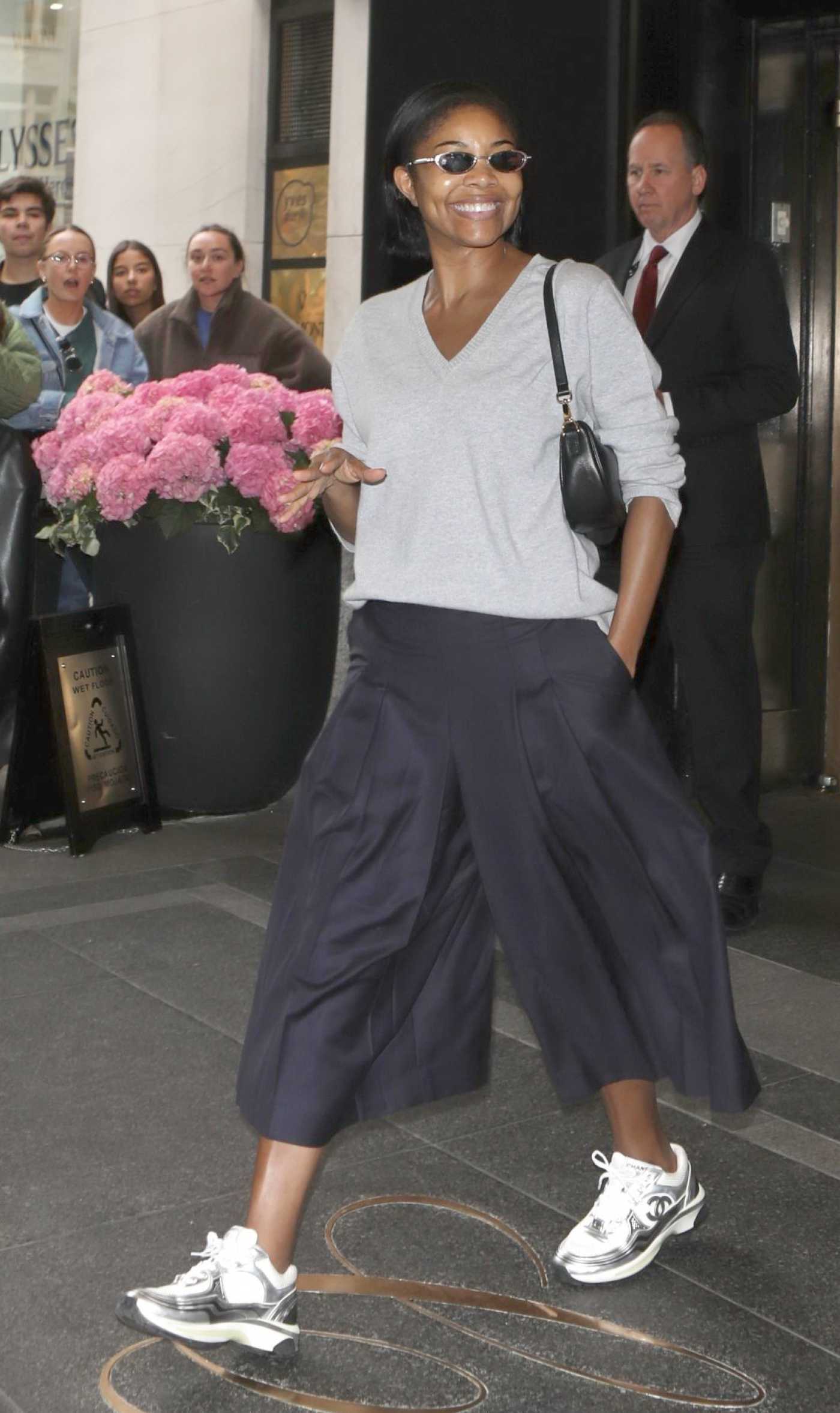 Gabrielle Union in a Grey Jumper Exit From Her Hotel in New York 05/04/2024