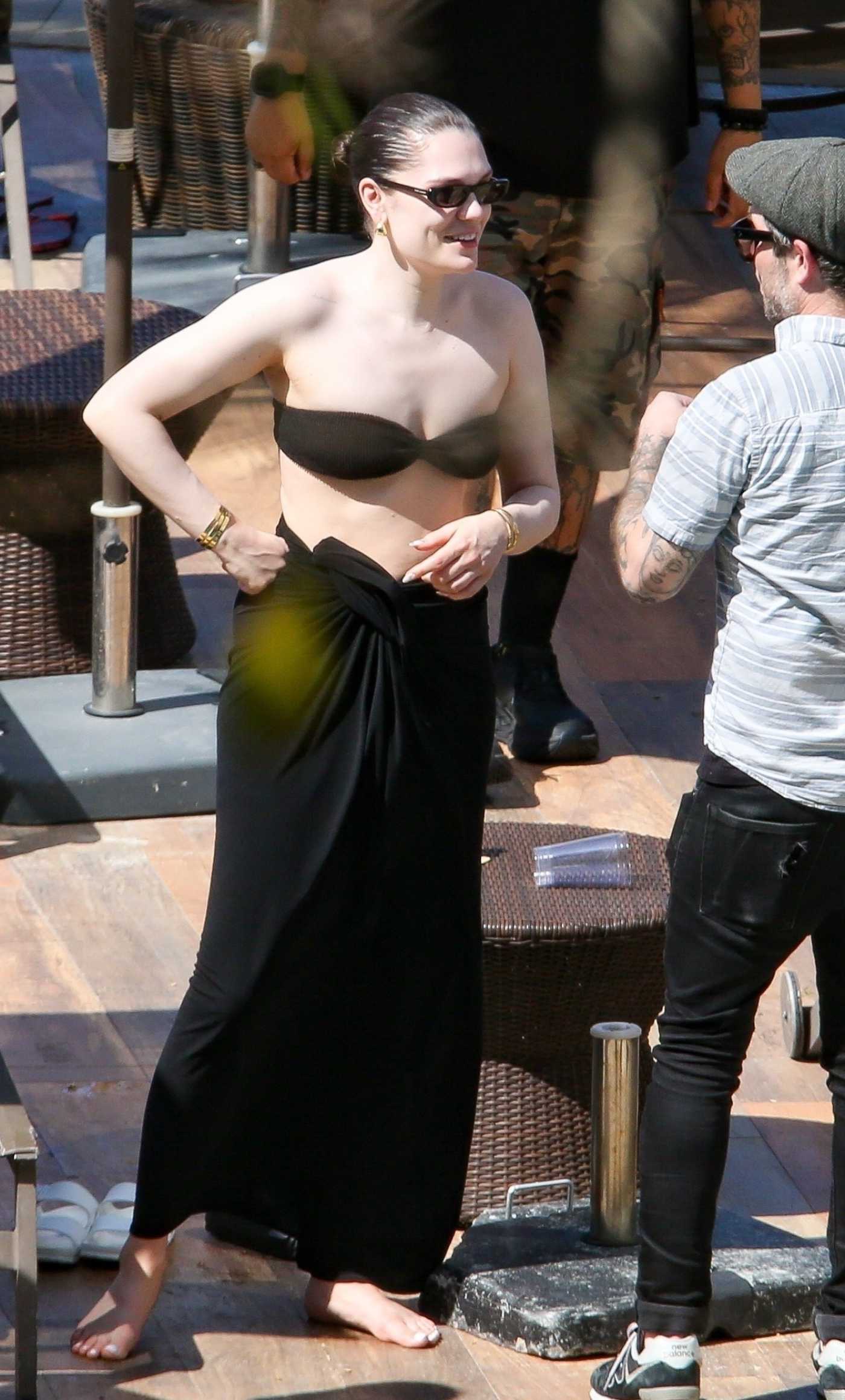 Jessie J in a Black Bikini Was Seen at the Pool of the Hotel in Rio de Janeiro 05/03/2024