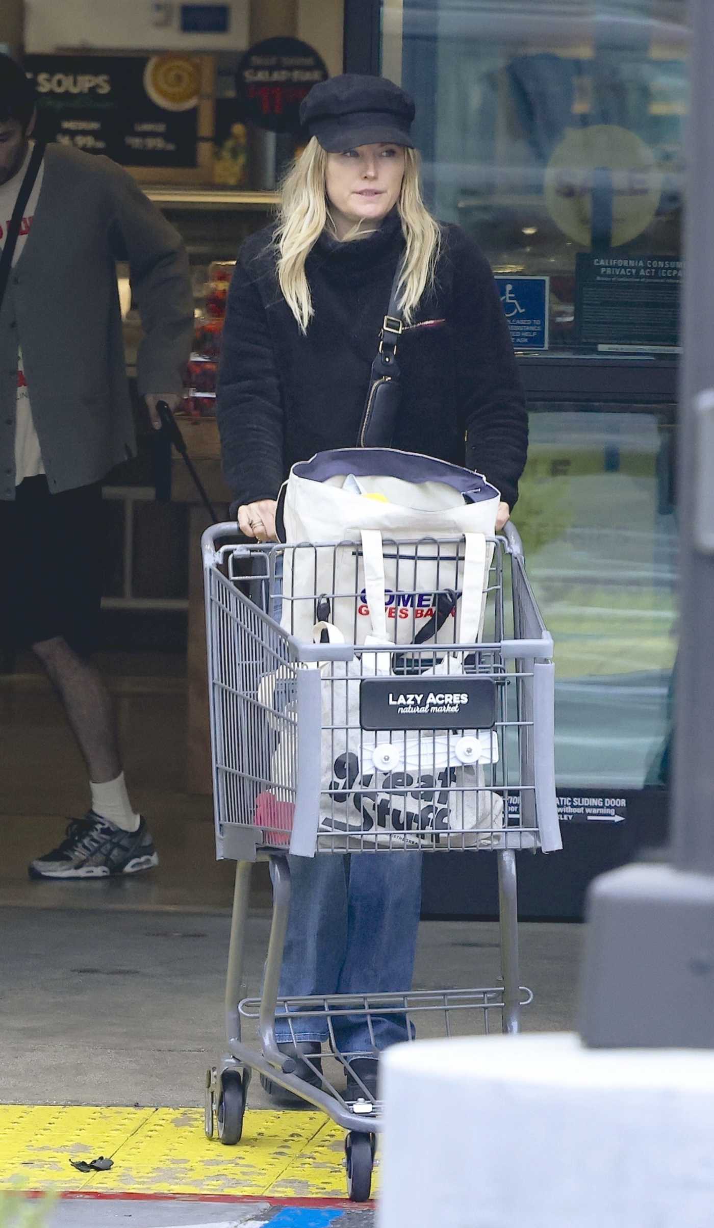 Malin Akerman in a Black Cap Picks Up Groceries at Lazy Acres in Los Feliz 05/28/2024