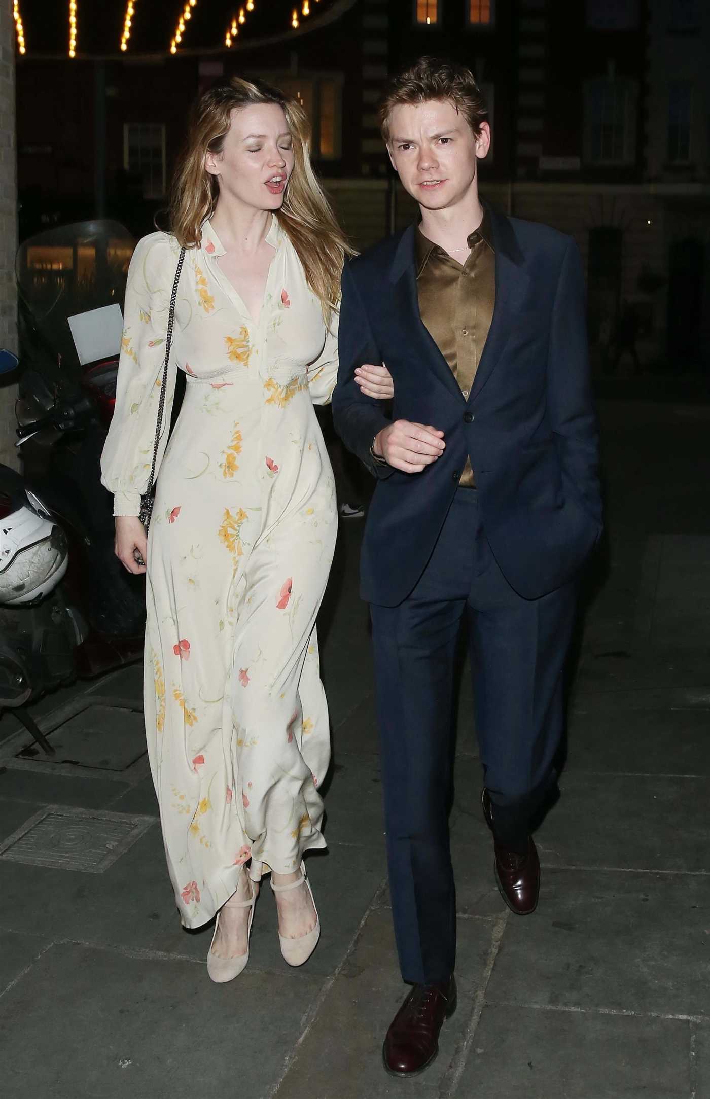 Talulah Riley in a Beige Dress Leaves the Everyman Cinema with Thomas Brodie-Sangster in London 05/08/2024