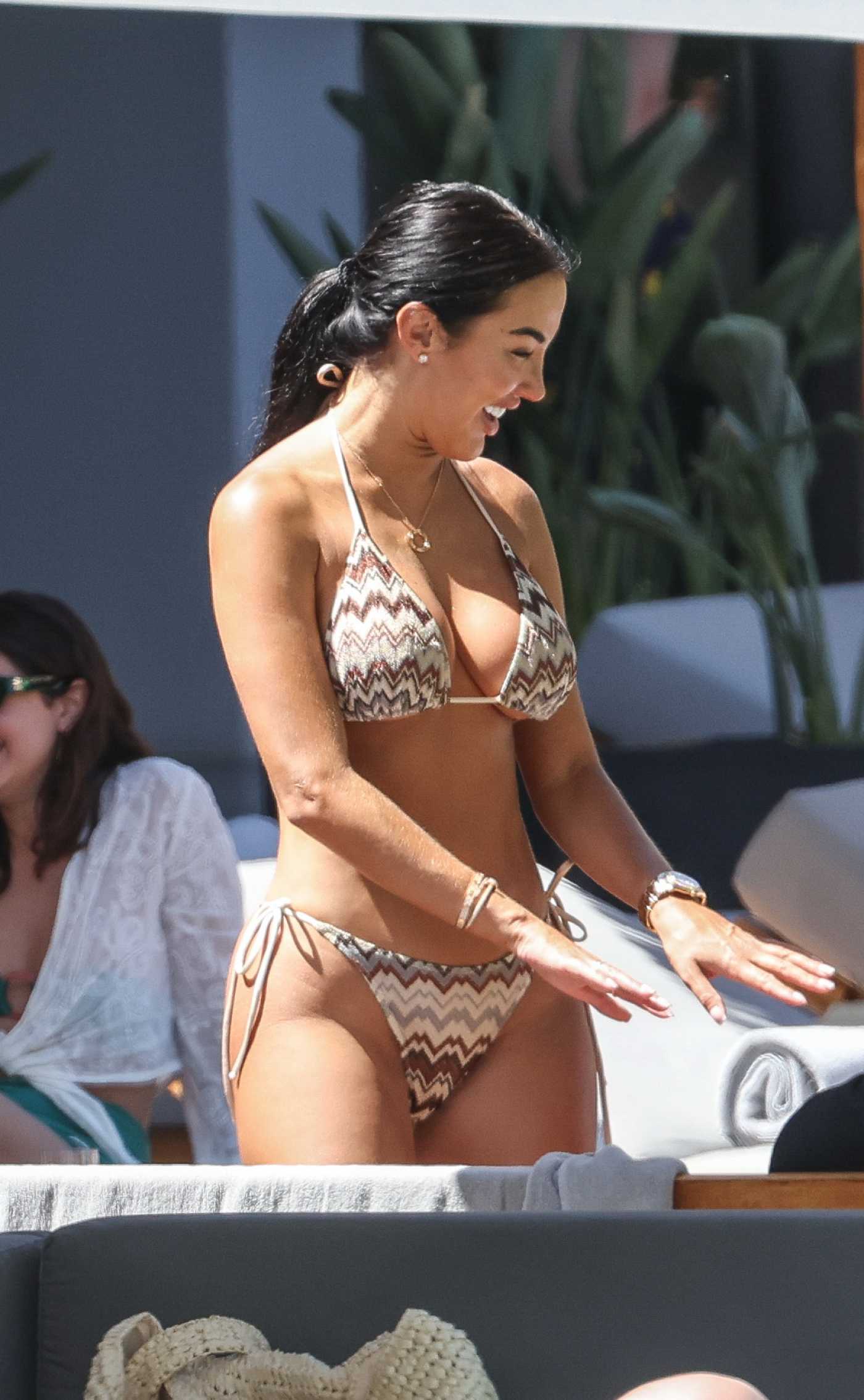 Yazmin Oukhellou in a Patterned Bikini on the Beach in Ibiza 05/13/2024