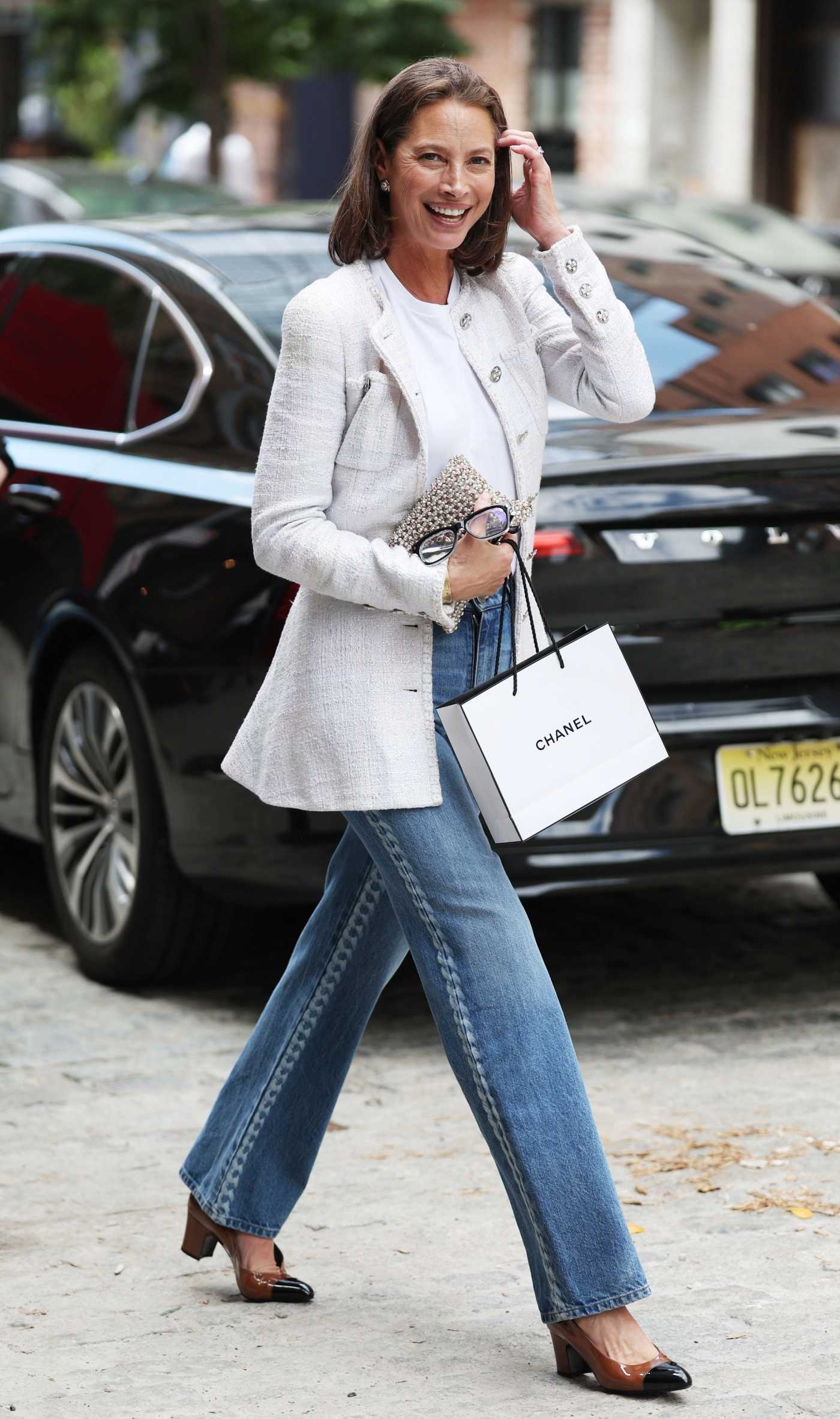 Christy Turlington in a White Cardigan Arrives at 2024 Chanel Tribeca Festival Women's Lunch in New York 06/07/2024