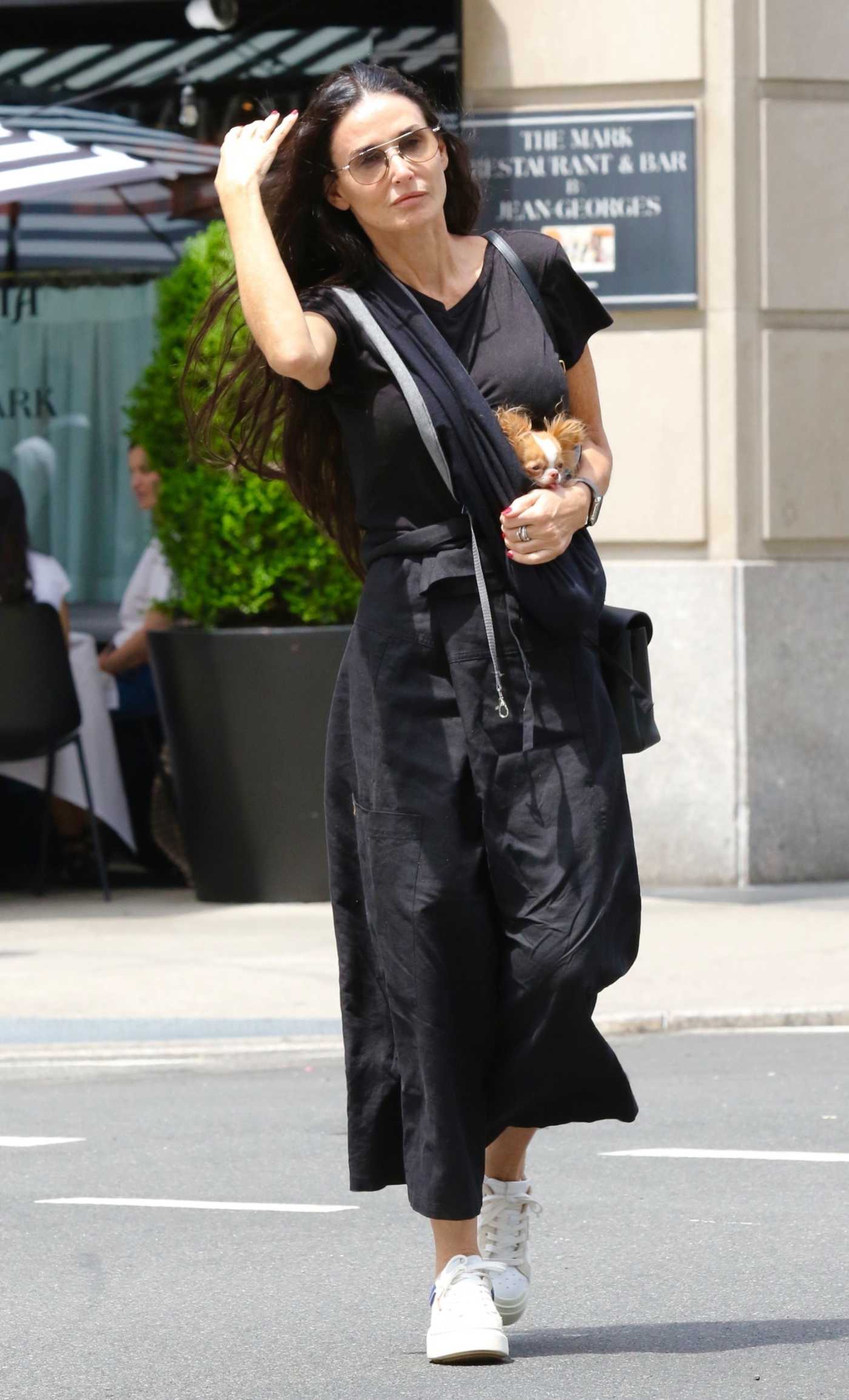 Demi Moore in a Black Tee Walks with Her Dog Around Manhattan’s Upper West Side in New York 06/04/2024