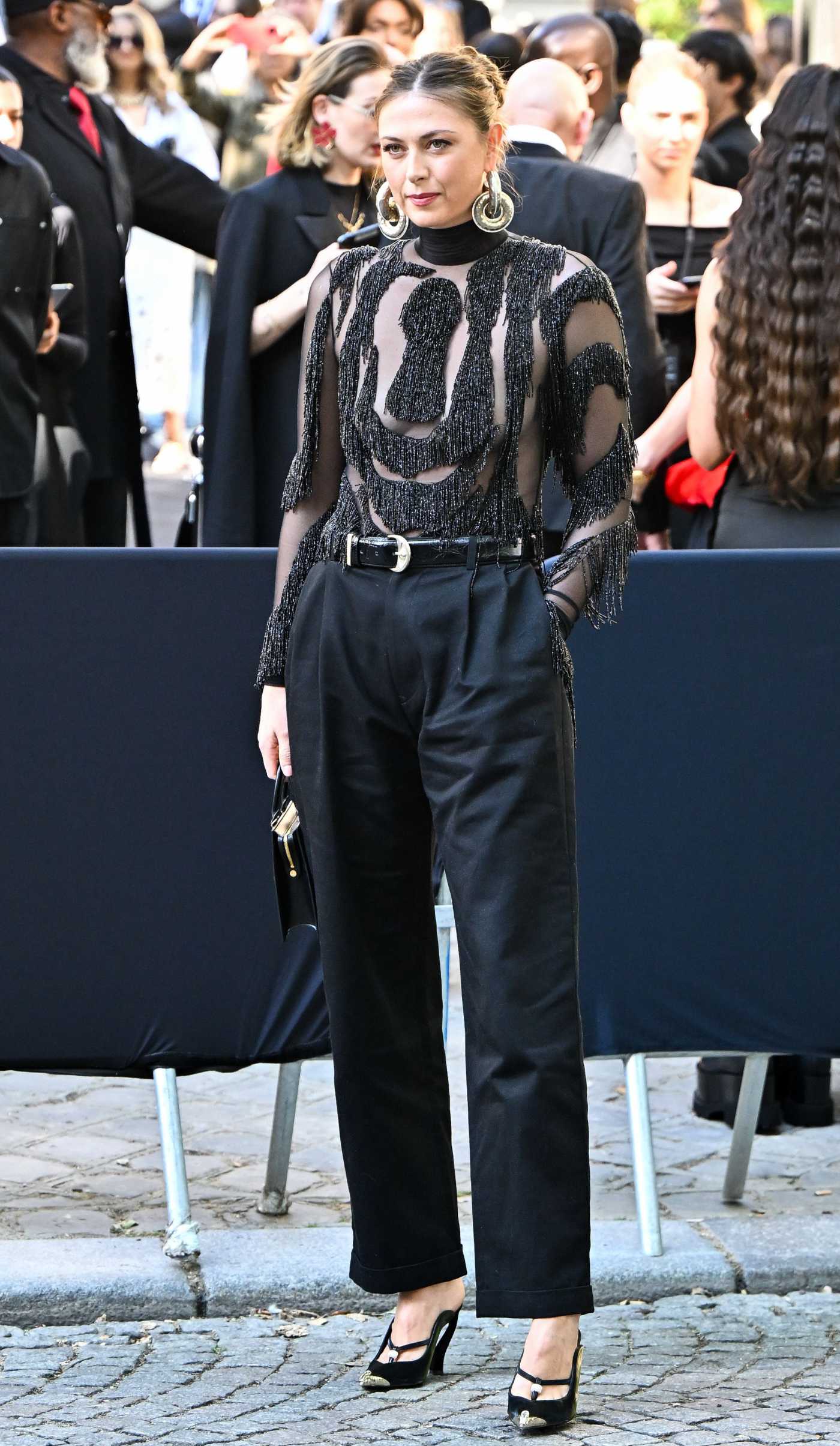 Maria Sharapova in a Black Blouse Attends the Schiaparelli Haute Couture Fashion Show During 2024 Paris Fashion Week in Paris 06/24/2024