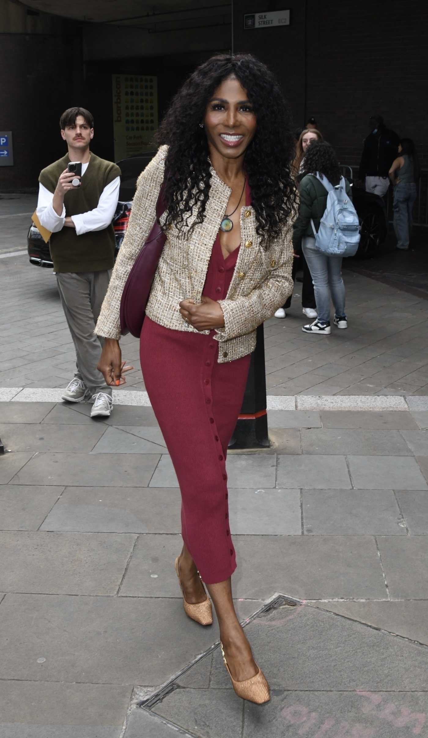 Sinitta in a Red Dress Arrives at Kiss Me Kate Press Night in London 06/18/2024