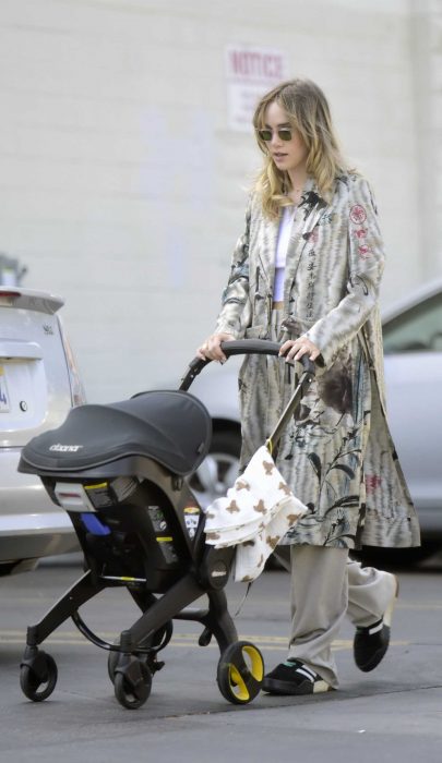 Suki Waterhouse in a Black Sneakers