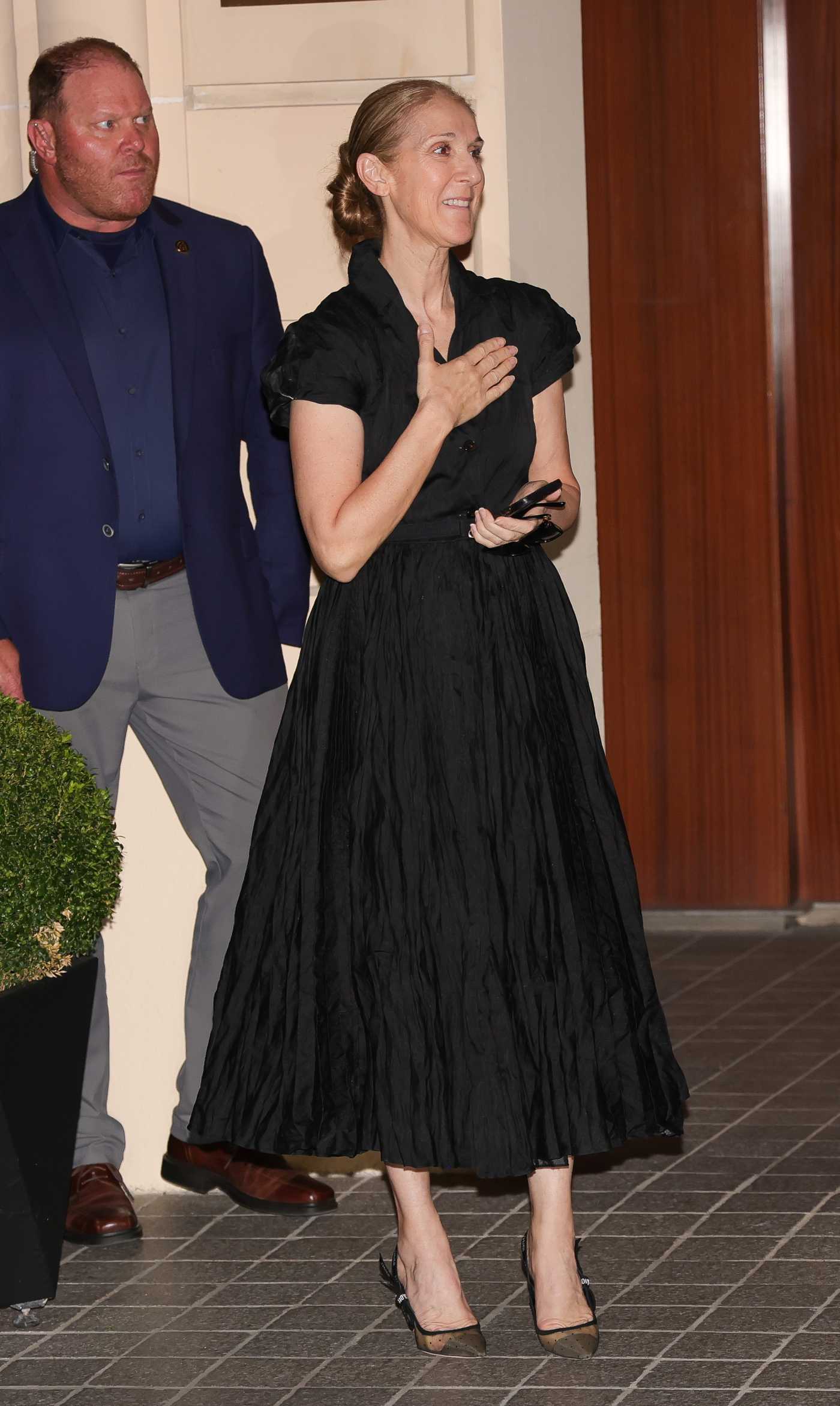 Celine Dion in a Black Dress Returns to Her Hotel in Paris 07/25/2024