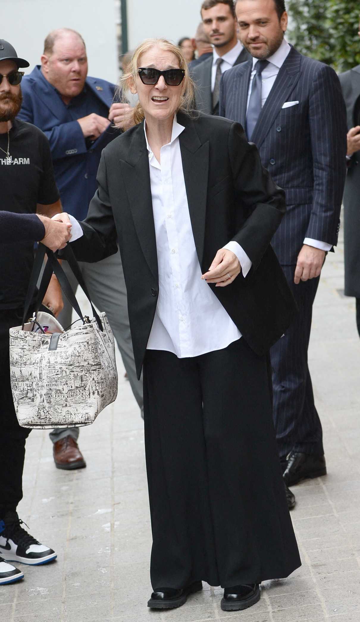 Celine Dion in a Black Pantsuit Arrives at the Royal Monceau Hotel in Paris 07/23/2024