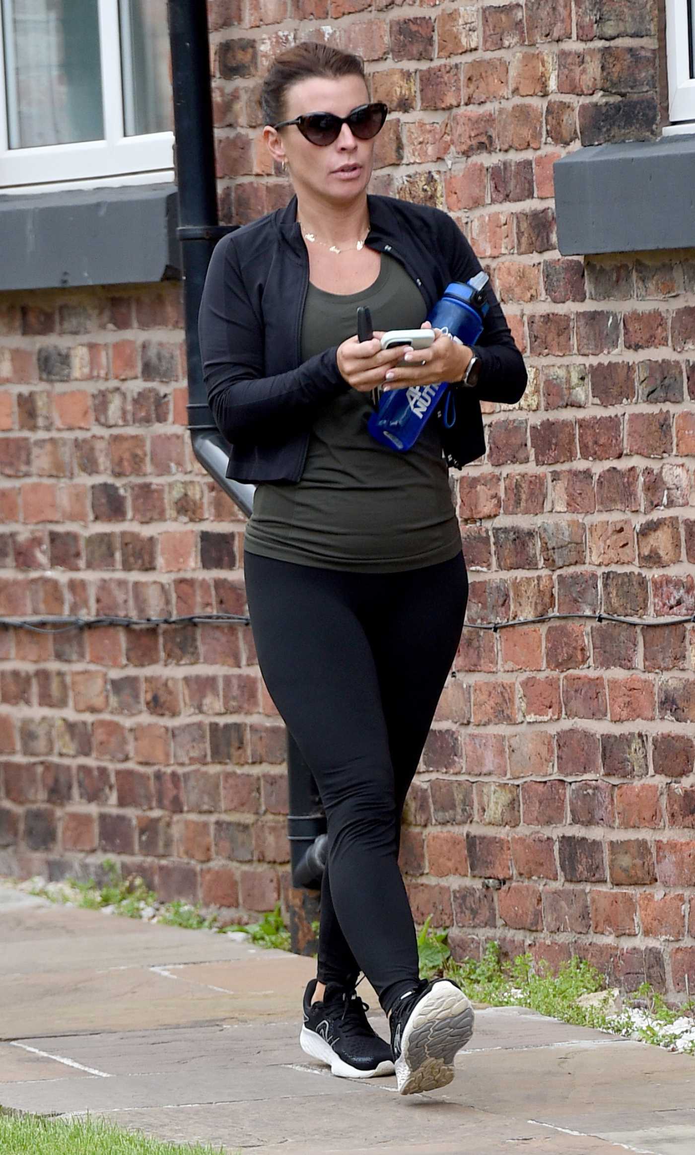 Coleen Rooney in a Black Sneakers Was Seen Out in Cheshire 07/25/2024