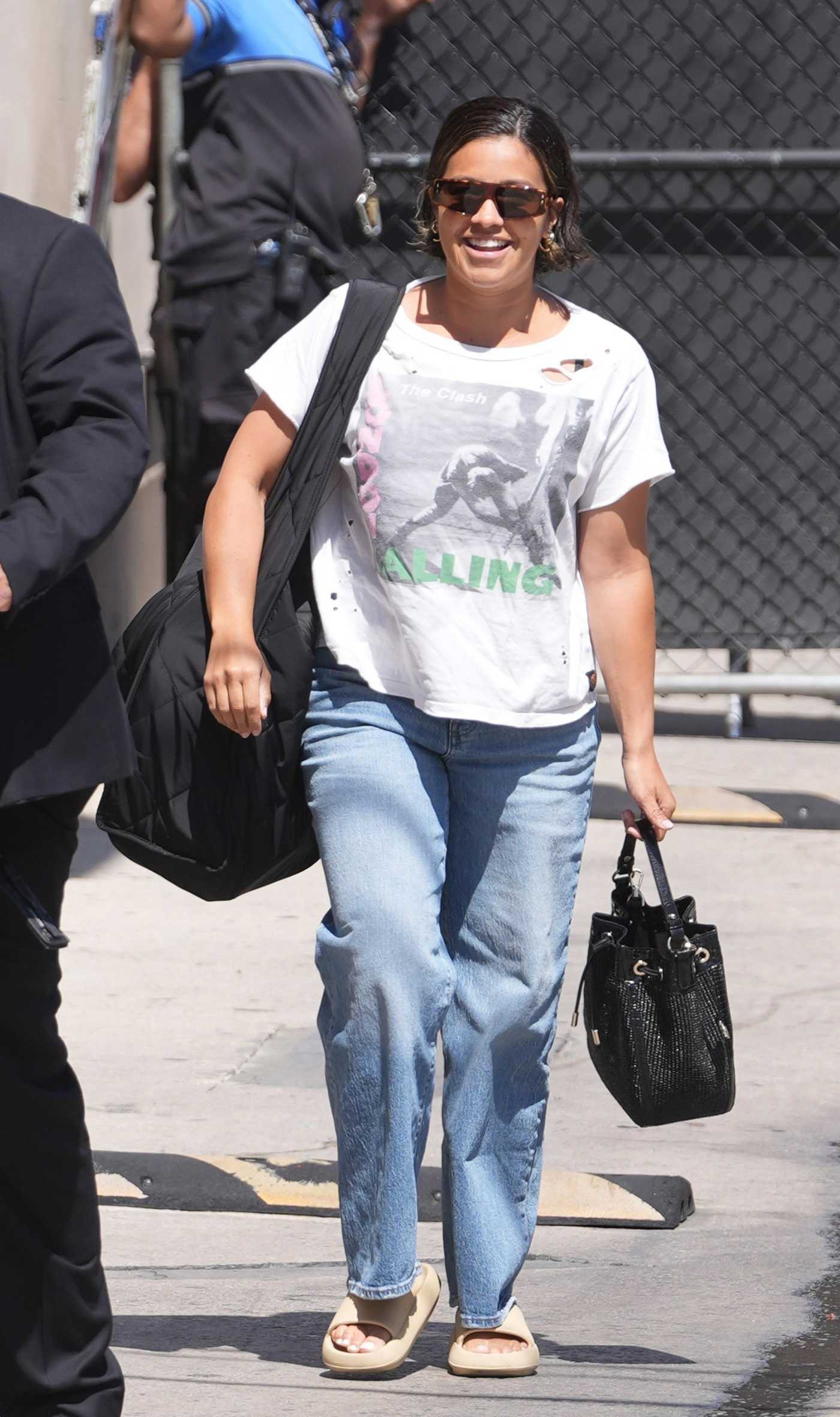 Gina Rodriguez in a White Tee Arrives at Jimmy Kimmel Live in Los Angeles 07/15/2024