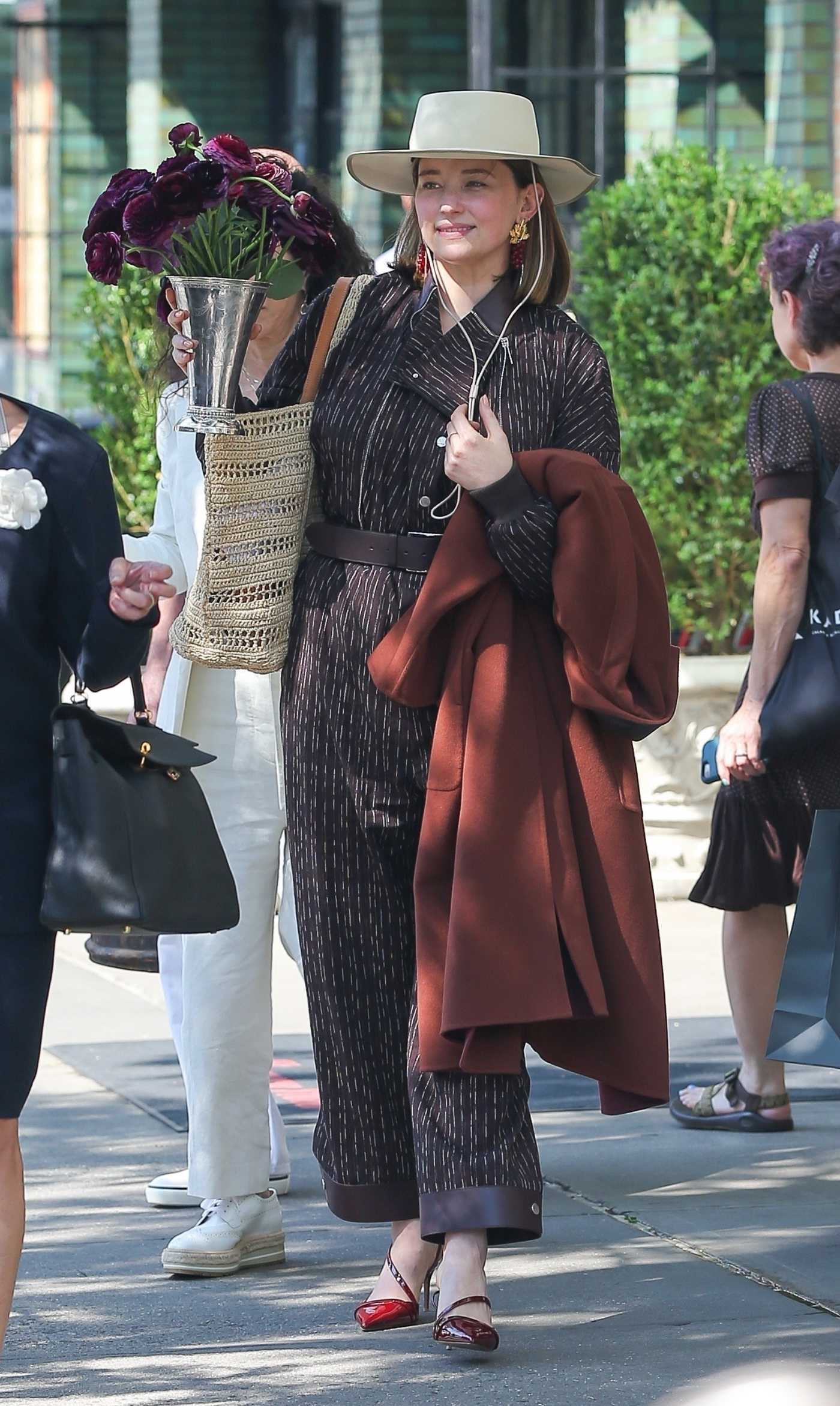 Haley Bennett in a Beige Hat Was Seen Out in New York 07/15/2024