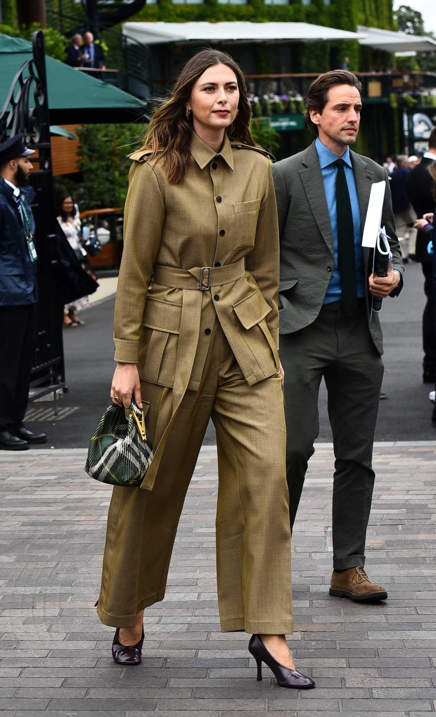 Maria Sharapova in a Mustard Pantsuit Arrives at All England Lawn Tennis Ground in London 07/03/2024