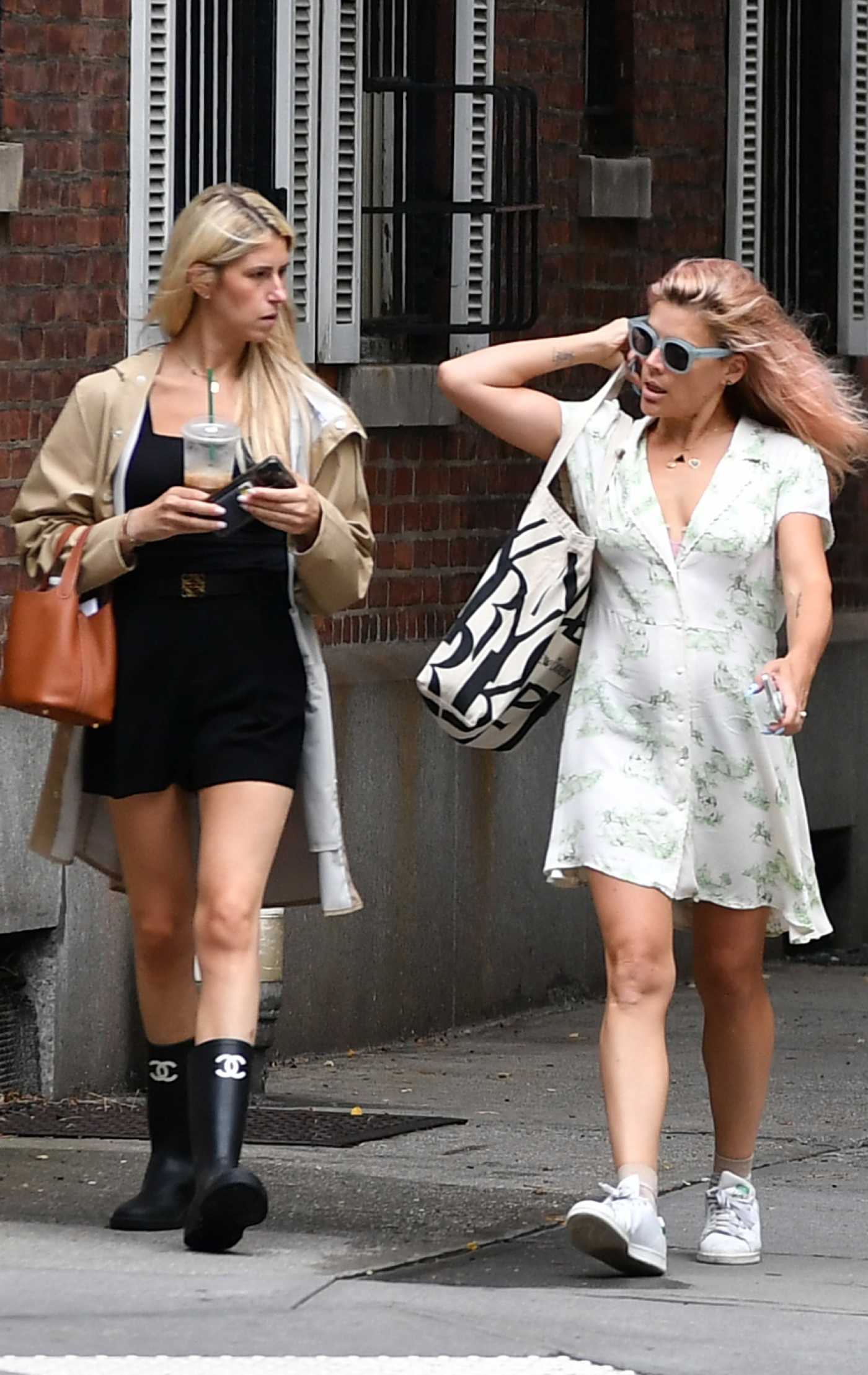 Busy Philipps in a White Sneakers Was Spotted on a Stroll with a Friend in New York 08/05/2024