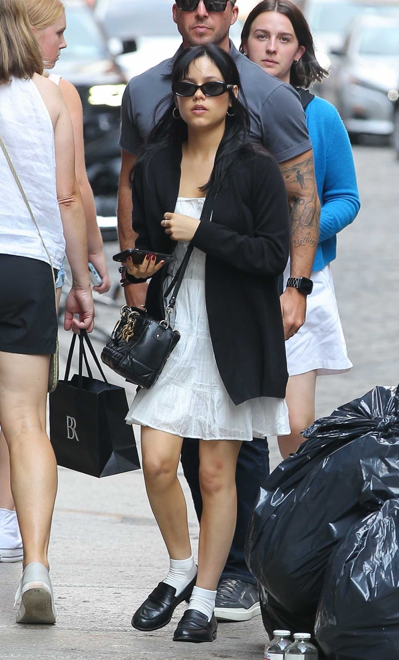 Jenna Ortega in a Black Cardigan Goes Shopping in New York 08/16/2024