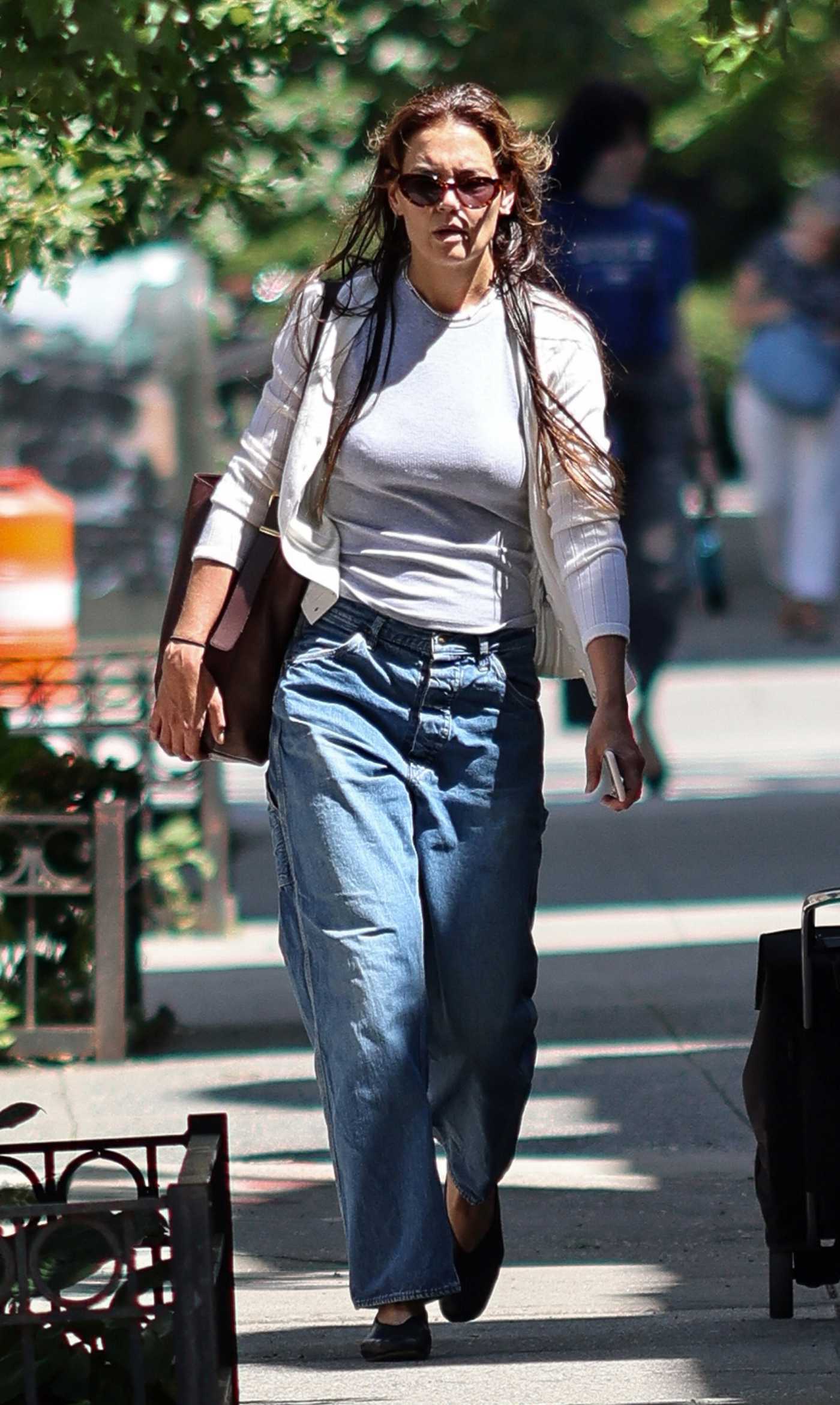 Katie Holmes in a White Cardigan Was Seen Out in New York 08/13/2024