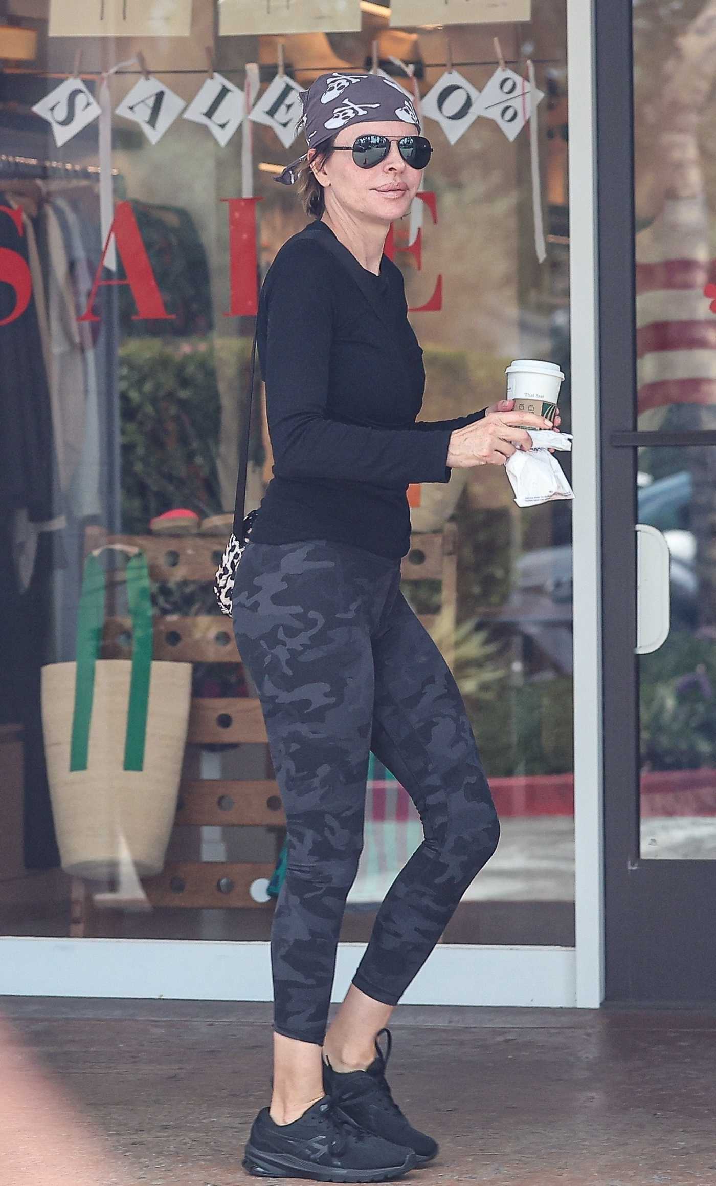 Lisa Rinna in a Black Sneakers Was Seen while Shopping for Coffee and Pastries at Starbucks in Los Angeles 08/01/2024