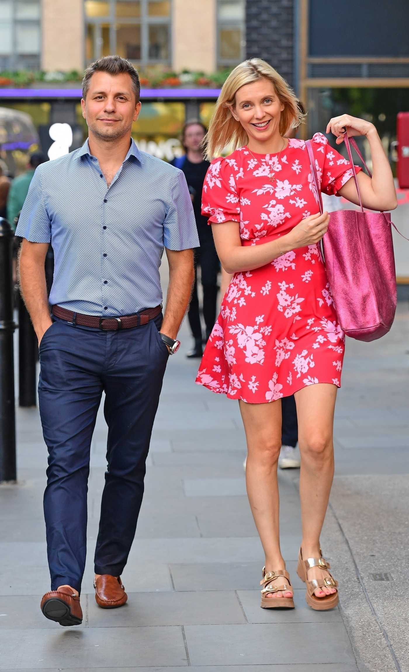 Rachel Riley in a Short Red Dress Was Seen Out with Her Husband Pasha Kovalev in Central London 07/31/2024