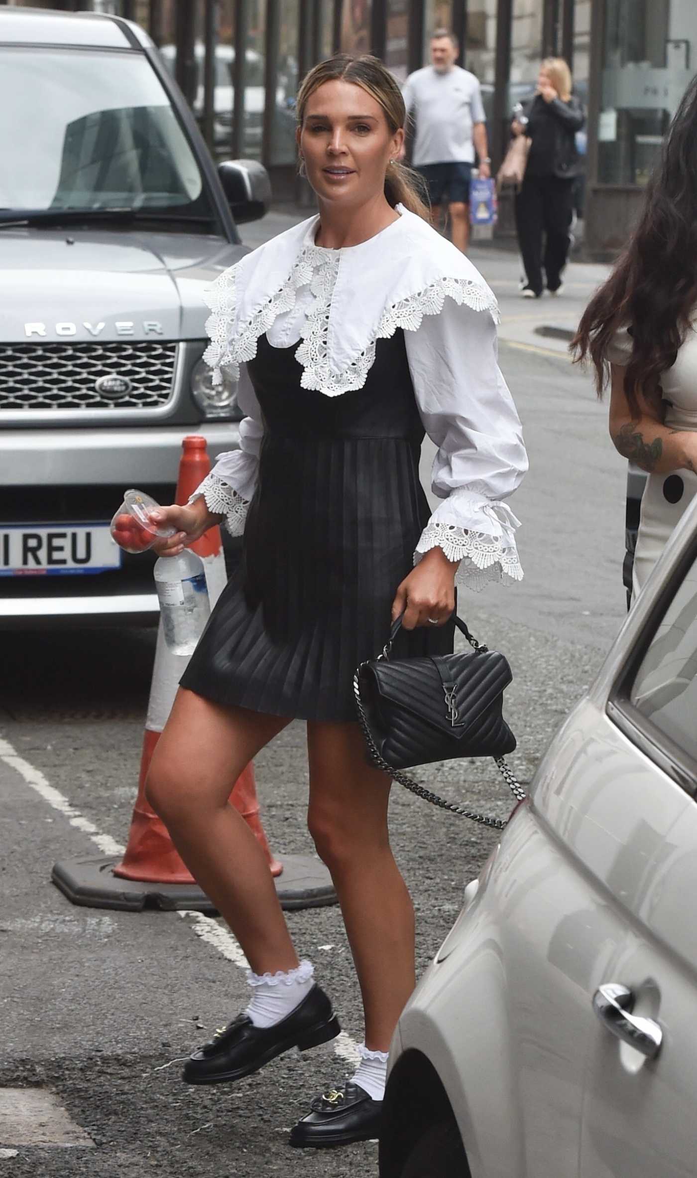 Danielle Lloyd in a White Blouse Attends the Bentley Club in Liverpool 09/01/2024