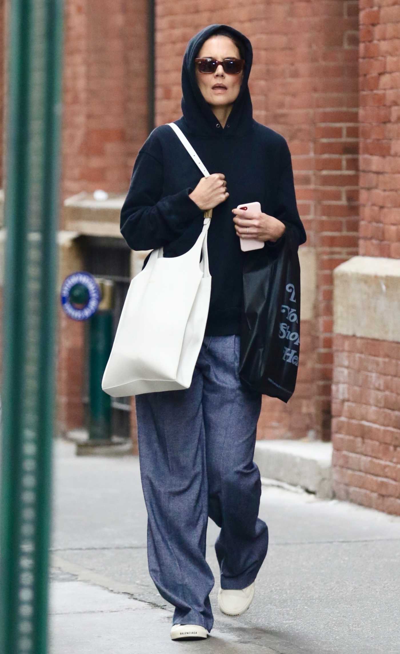 Katie Holmes in a Black Hoodie Was Seen Out Shopping in NYC 09/24/2024