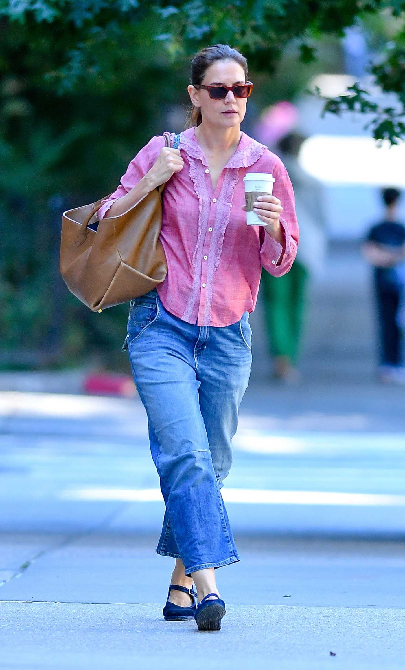 Katie Holmes in a Pink Blouse Was Seen On a Coffee Run in New York City 09/03/2024