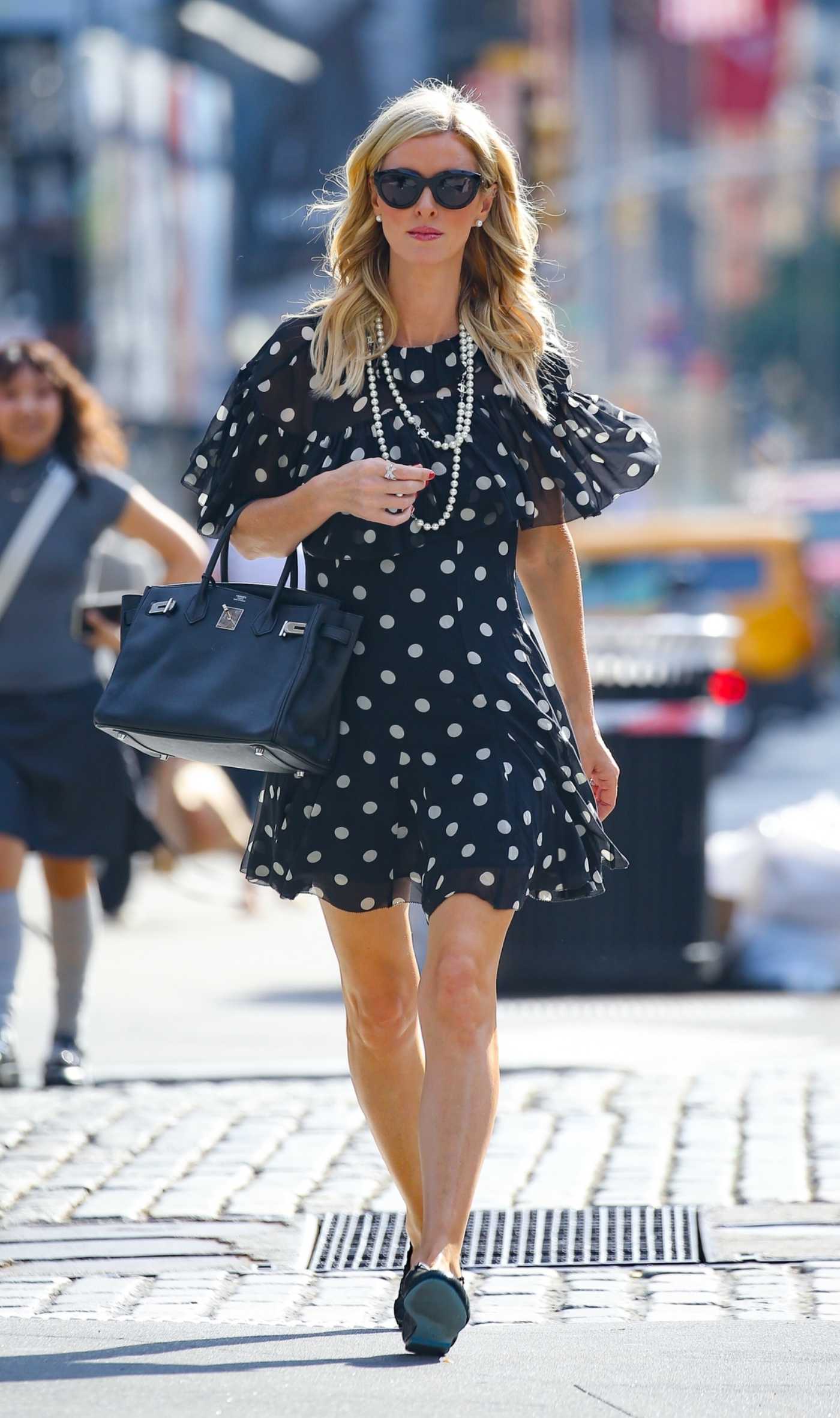 Nicky Hilton in a Black Polka Dot Dress Was Seen Out in New York City 09/19/2024