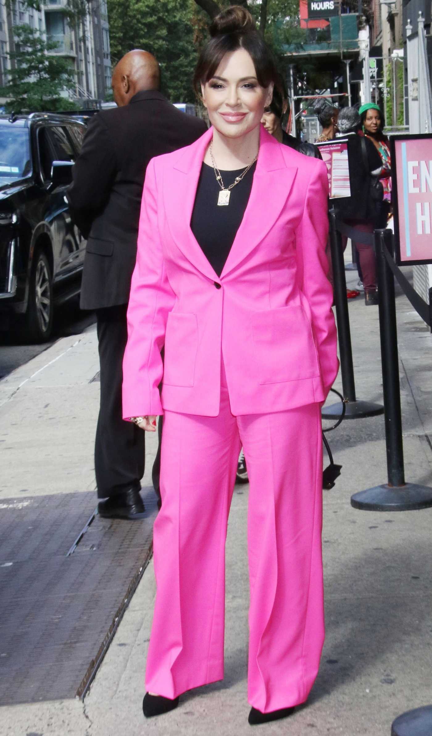 Alyssa Milano in a Pink Pantsuit Was Seen Out in New York 09/30/2024