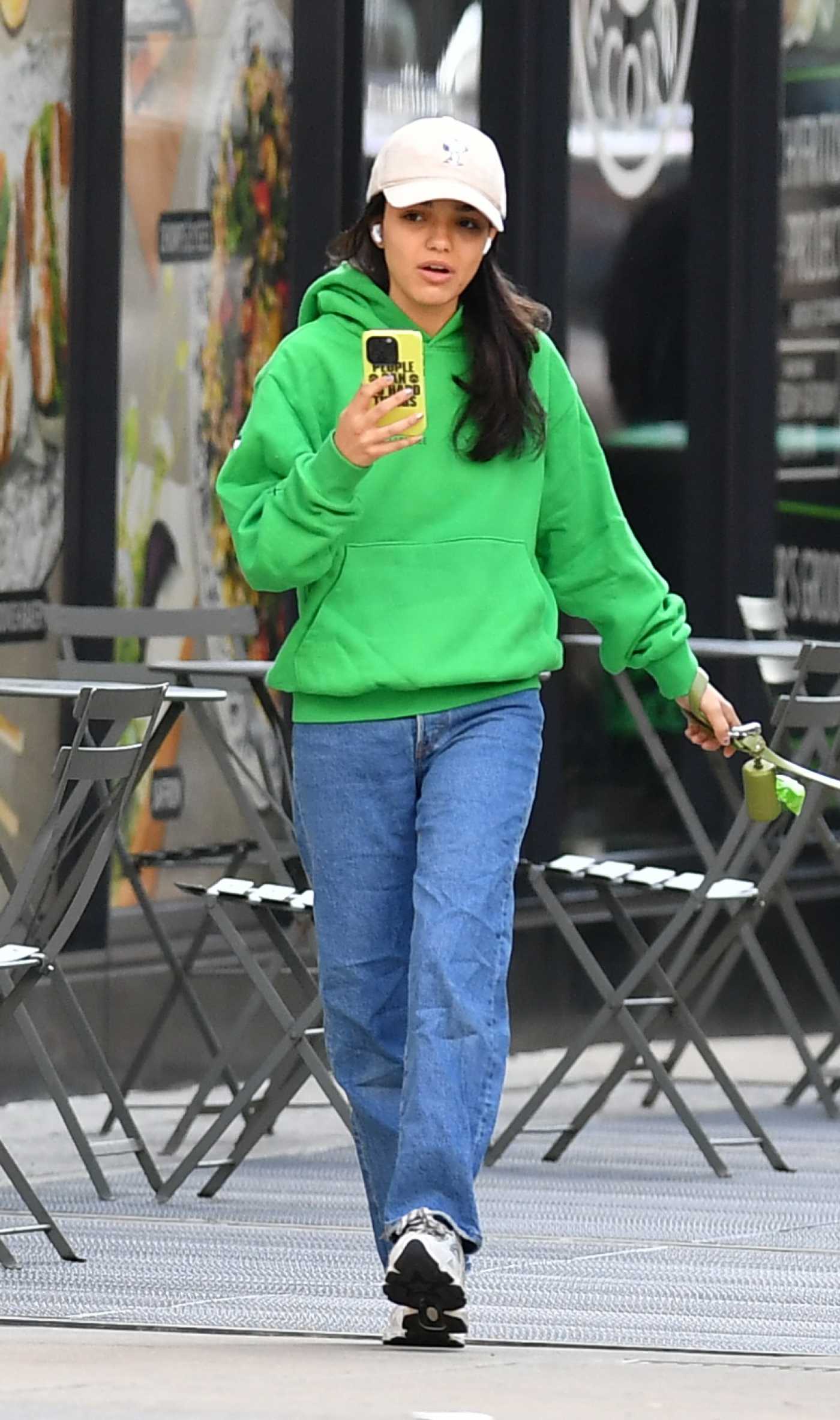 Rachel Zegler in a Green Hoodie Walking Her Dog in New York 10/05/2024