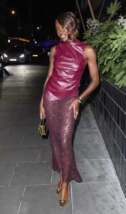 AJ Odudu in a Purple See-Through Skirt