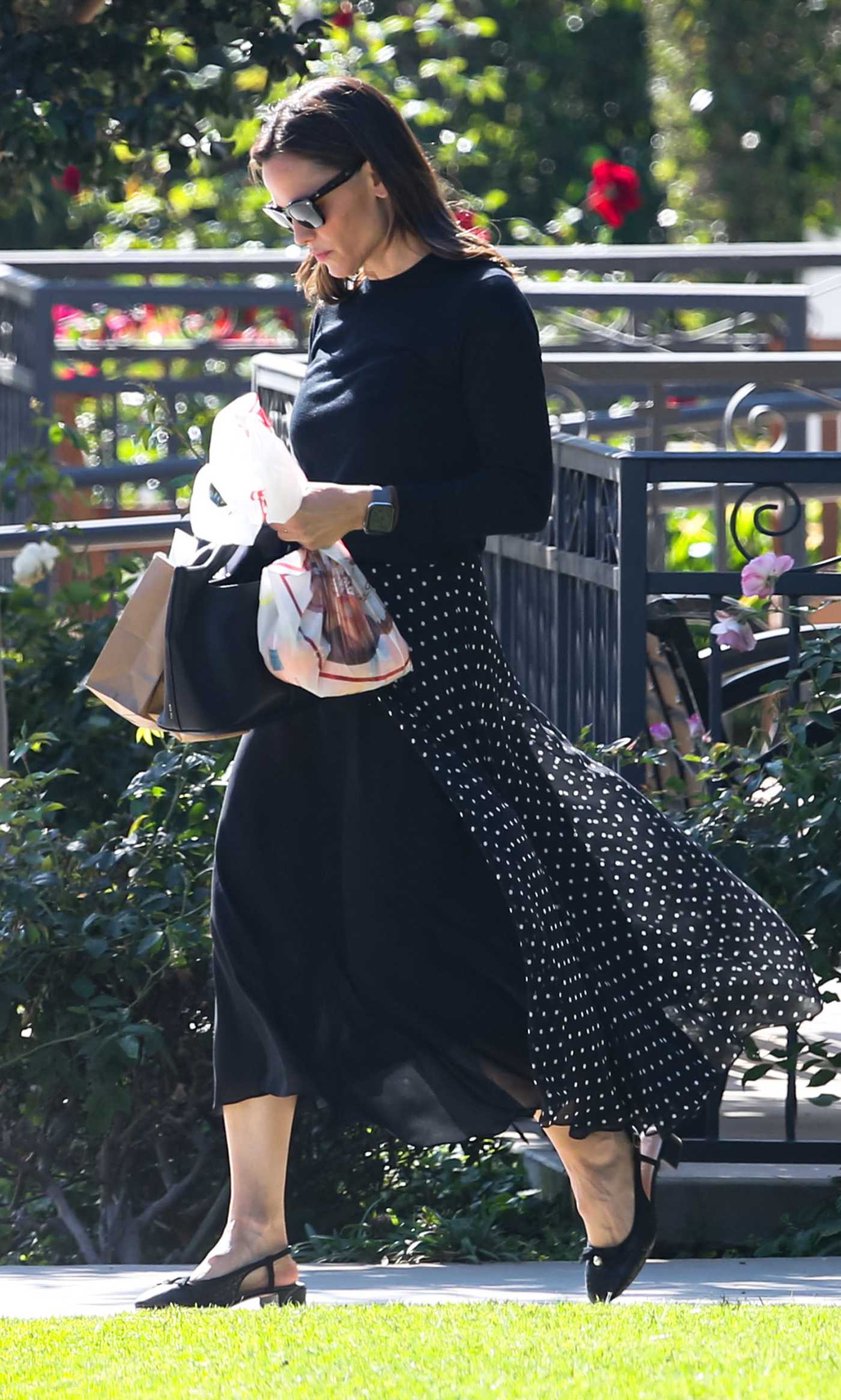 Jennifer Garner in a Black Polka Dot Skirt Leaves United Methodist Church in Los Angeles 11/10/2024