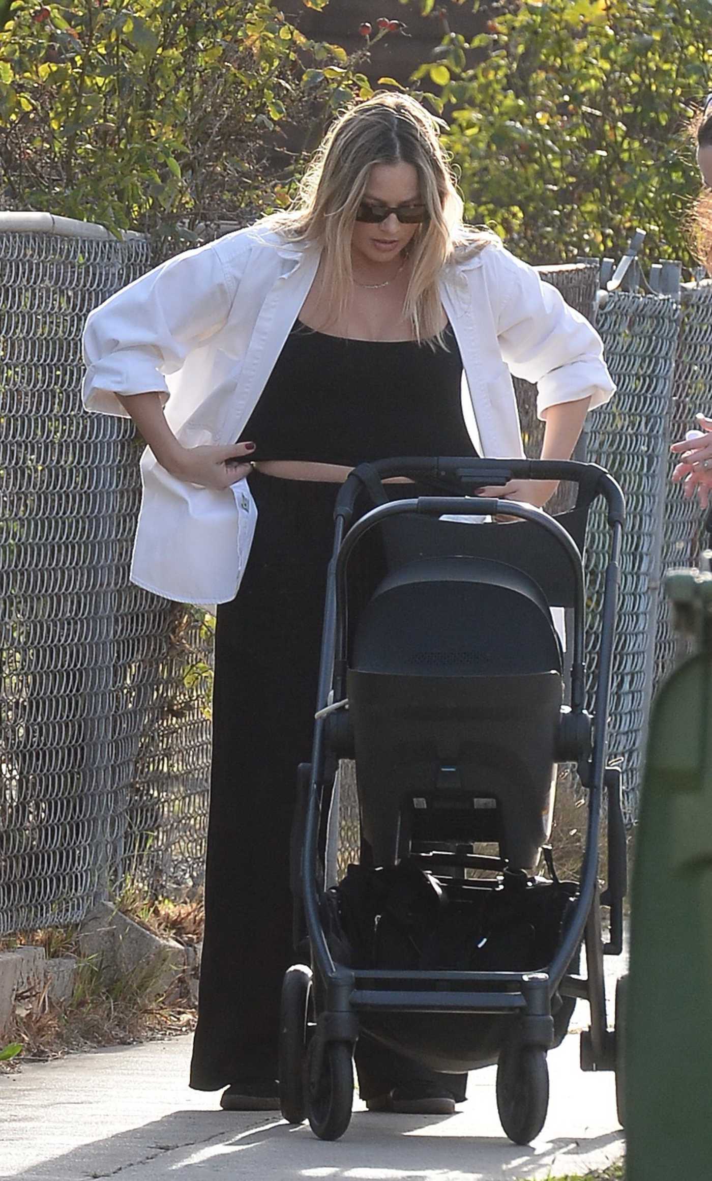 Margot Robbie in a White Shirt Was Seen Out with Her Baby and a Friend in Los Angeles 11/06/2024