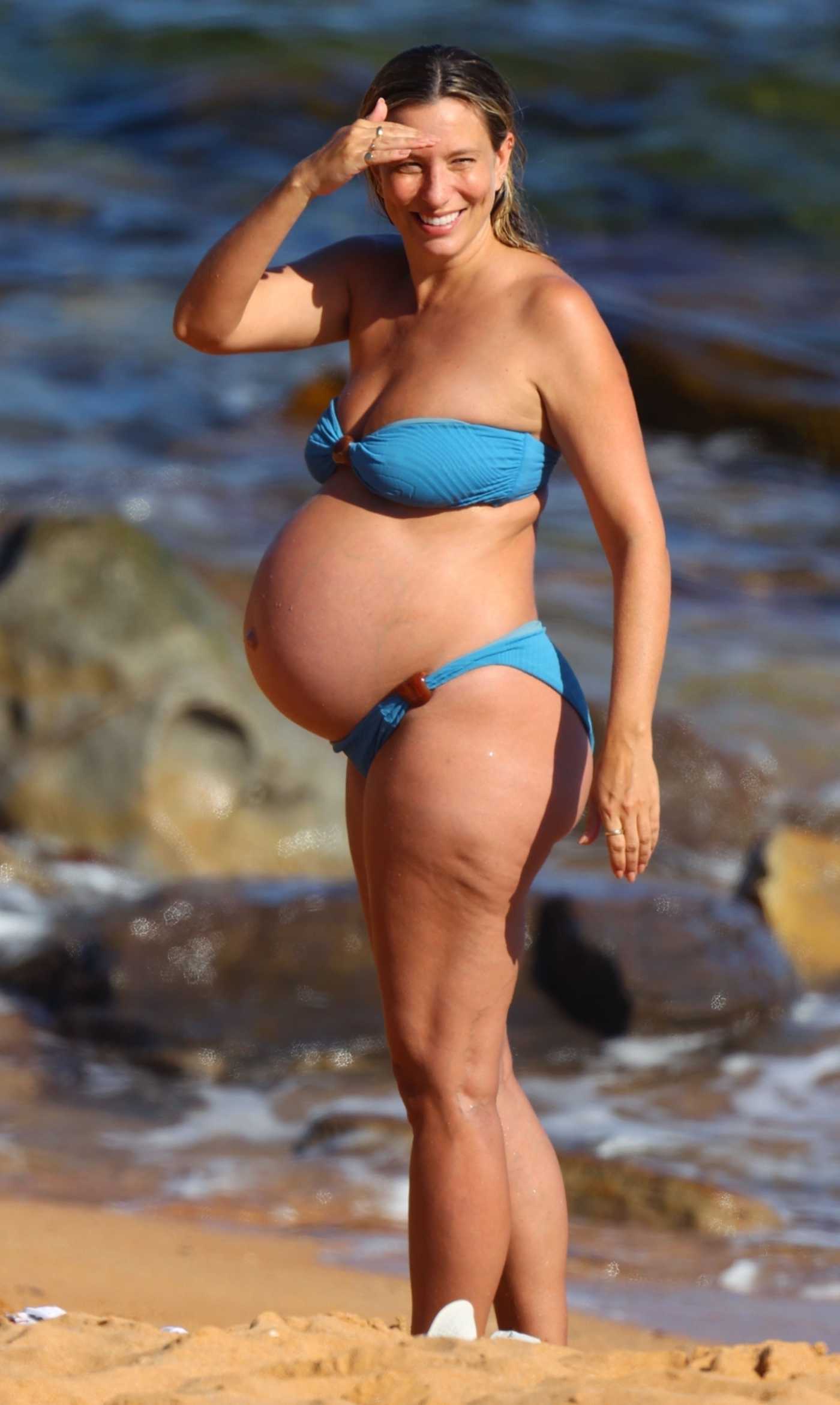 Renee Bargh in a Blue Bikini Shows off Her Growing Baby Bump on the Beach in Sydney 11/24/2024